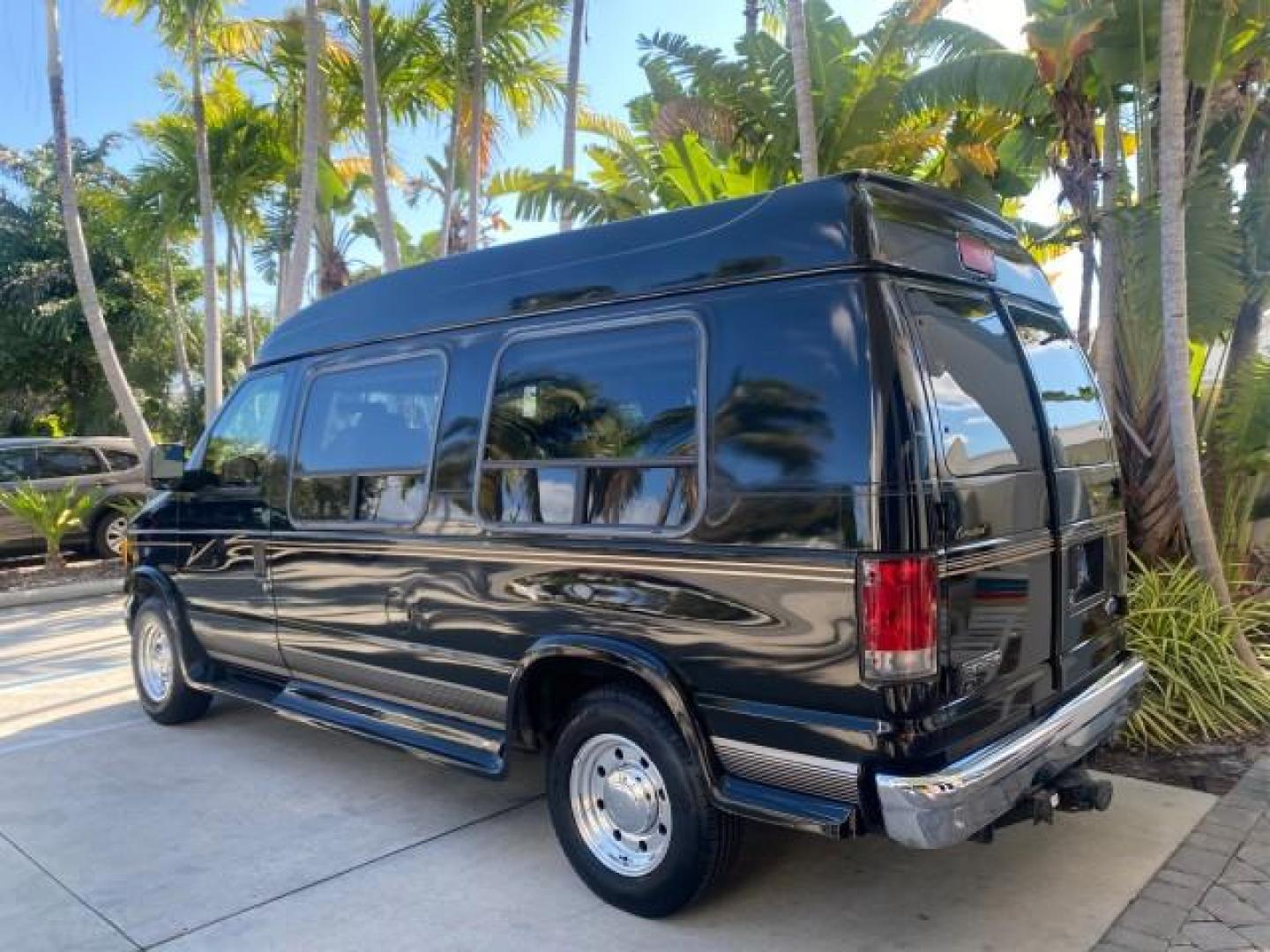 2006 Black /Medium Pebble Ford Econoline HI TOP E250 EXPLORER CONVERSION HANDICAP (1FDNE24L26H) with an 5.4L SOHC EFI V8 Triton Engine engine, Automatic transmission, located at 4701 North Dixie Hwy, Pompano Beach, FL, 33064, (954) 422-2889, 26.240938, -80.123474 - OUR WEBPAGE FLORIDACARS1.COM HAS OVER 100 PHOTOS AND FREE CARFAX LINK 2006 FORD ECONOLINE E250 EXPLORER CONVERSION HANDICAP $90,000 NEW VIN: 1FDNE24L26HA32770 1 F D N E 2 4 L 2 6 H A 3 2 7 7 0 VAN 5.4L V8 F GASOLINE REAR WHEEL DRIVE Features ABS Brakes Air Conditioning Alloy Wheels AM/FM Stereo Auto - Photo#34