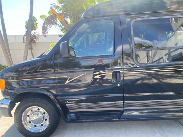 2006 Black /Medium Pebble Ford Econoline HI TOP E250 EXPLORER CONVERSION HANDICAP (1FDNE24L26H) with an 5.4L SOHC EFI V8 Triton Engine engine, Automatic transmission, located at 4701 North Dixie Hwy, Pompano Beach, FL, 33064, (954) 422-2889, 26.240938, -80.123474 - OUR WEBPAGE FLORIDACARS1.COM HAS OVER 100 PHOTOS AND FREE CARFAX LINK 2006 FORD ECONOLINE E250 EXPLORER CONVERSION HANDICAP $90,000 NEW VIN: 1FDNE24L26HA32770 1 F D N E 2 4 L 2 6 H A 3 2 7 7 0 VAN 5.4L V8 F GASOLINE REAR WHEEL DRIVE Features ABS Brakes Air Conditioning Alloy Wheels AM/FM Stereo Auto - Photo#38