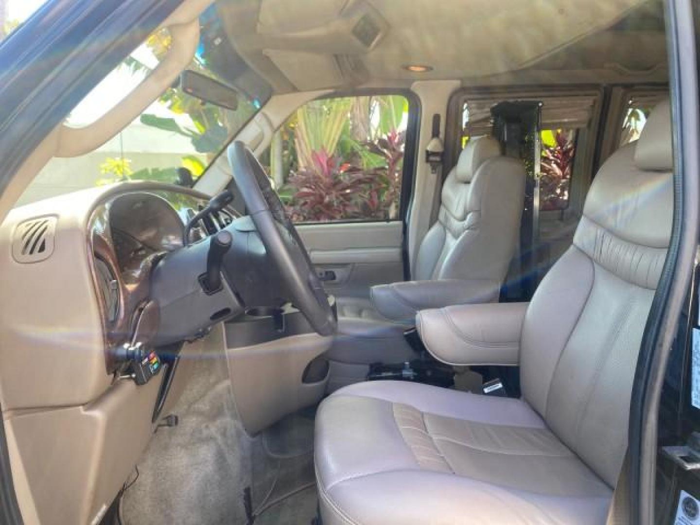 2006 Black /Medium Pebble Ford Econoline HI TOP E250 EXPLORER CONVERSION HANDICAP (1FDNE24L26H) with an 5.4L SOHC EFI V8 Triton Engine engine, Automatic transmission, located at 4701 North Dixie Hwy, Pompano Beach, FL, 33064, (954) 422-2889, 26.240938, -80.123474 - OUR WEBPAGE FLORIDACARS1.COM HAS OVER 100 PHOTOS AND FREE CARFAX LINK 2006 FORD ECONOLINE E250 EXPLORER CONVERSION HANDICAP $90,000 NEW VIN: 1FDNE24L26HA32770 1 F D N E 2 4 L 2 6 H A 3 2 7 7 0 VAN 5.4L V8 F GASOLINE REAR WHEEL DRIVE Features ABS Brakes Air Conditioning Alloy Wheels AM/FM Stereo Auto - Photo#45