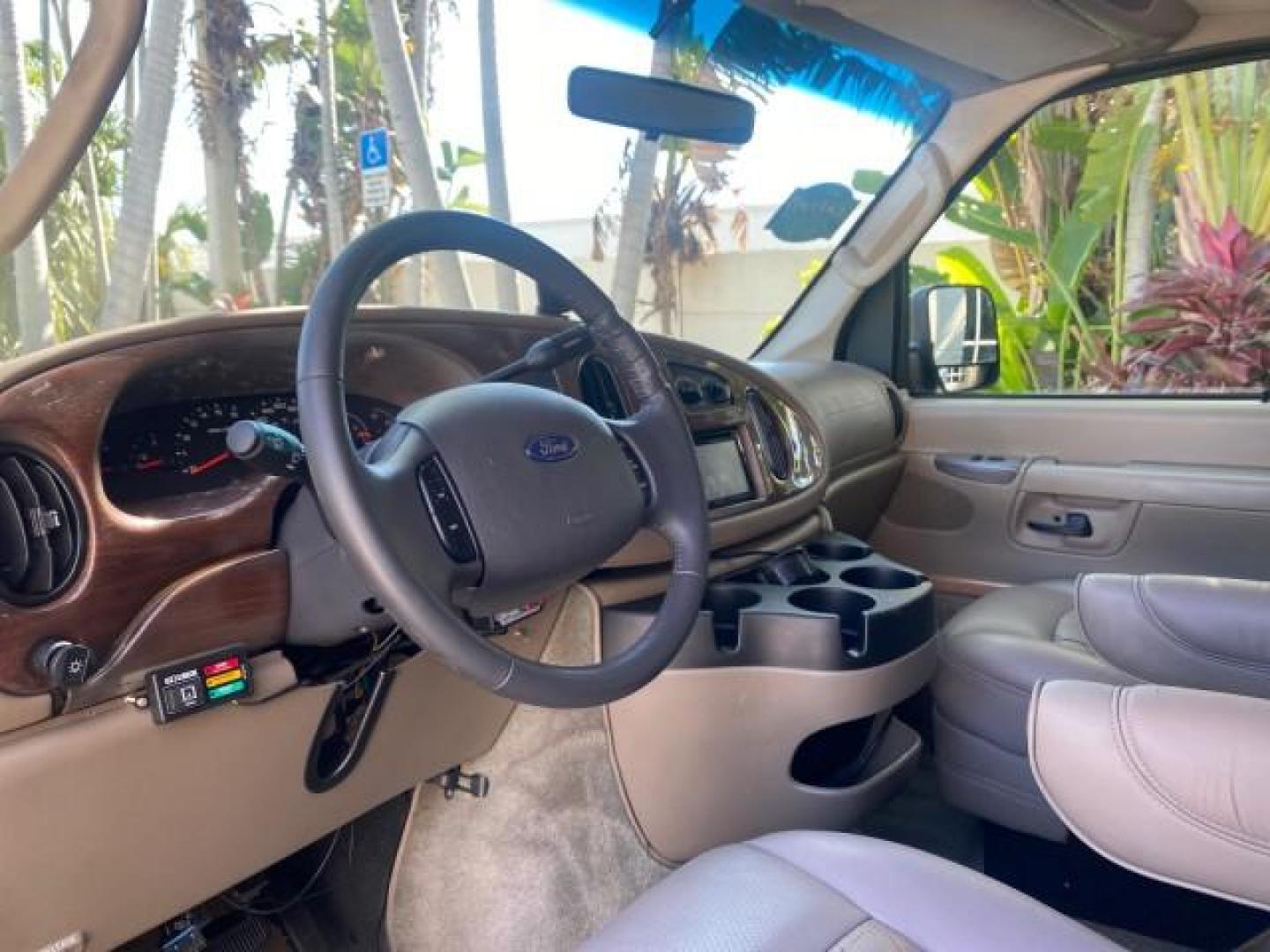 2006 Black /Medium Pebble Ford Econoline HI TOP E250 EXPLORER CONVERSION HANDICAP (1FDNE24L26H) with an 5.4L SOHC EFI V8 Triton Engine engine, Automatic transmission, located at 4701 North Dixie Hwy, Pompano Beach, FL, 33064, (954) 422-2889, 26.240938, -80.123474 - OUR WEBPAGE FLORIDACARS1.COM HAS OVER 100 PHOTOS AND FREE CARFAX LINK 2006 FORD ECONOLINE E250 EXPLORER CONVERSION HANDICAP $90,000 NEW VIN: 1FDNE24L26HA32770 1 F D N E 2 4 L 2 6 H A 3 2 7 7 0 VAN 5.4L V8 F GASOLINE REAR WHEEL DRIVE Features ABS Brakes Air Conditioning Alloy Wheels AM/FM Stereo Auto - Photo#50