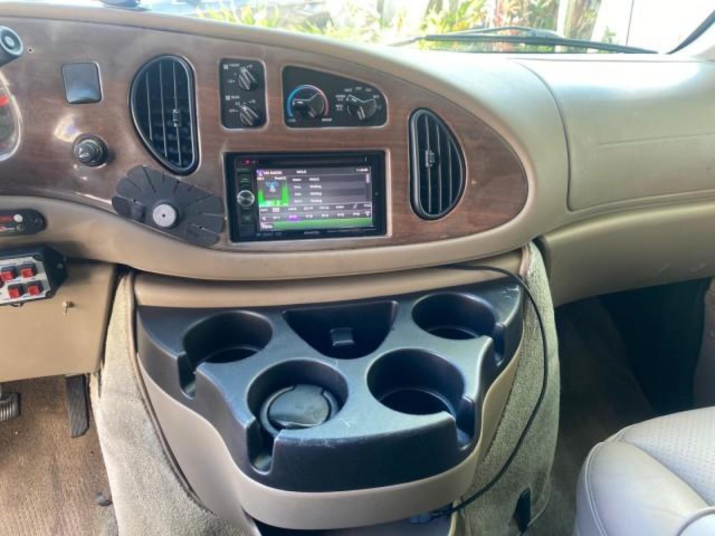 2006 Black /Medium Pebble Ford Econoline HI TOP E250 EXPLORER CONVERSION HANDICAP (1FDNE24L26H) with an 5.4L SOHC EFI V8 Triton Engine engine, Automatic transmission, located at 4701 North Dixie Hwy, Pompano Beach, FL, 33064, (954) 422-2889, 26.240938, -80.123474 - OUR WEBPAGE FLORIDACARS1.COM HAS OVER 100 PHOTOS AND FREE CARFAX LINK 2006 FORD ECONOLINE E250 EXPLORER CONVERSION HANDICAP $90,000 NEW VIN: 1FDNE24L26HA32770 1 F D N E 2 4 L 2 6 H A 3 2 7 7 0 VAN 5.4L V8 F GASOLINE REAR WHEEL DRIVE Features ABS Brakes Air Conditioning Alloy Wheels AM/FM Stereo Auto - Photo#60