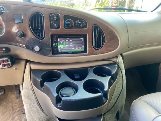 2006 Black /Medium Pebble Ford Econoline HI TOP E250 EXPLORER CONVERSION HANDICAP (1FDNE24L26H) with an 5.4L SOHC EFI V8 Triton Engine engine, Automatic transmission, located at 4701 North Dixie Hwy, Pompano Beach, FL, 33064, (954) 422-2889, 26.240938, -80.123474 - OUR WEBPAGE FLORIDACARS1.COM HAS OVER 100 PHOTOS AND FREE CARFAX LINK 2006 FORD ECONOLINE E250 EXPLORER CONVERSION HANDICAP $90,000 NEW VIN: 1FDNE24L26HA32770 1 F D N E 2 4 L 2 6 H A 3 2 7 7 0 VAN 5.4L V8 F GASOLINE REAR WHEEL DRIVE Features ABS Brakes Air Conditioning Alloy Wheels AM/FM Stereo Auto - Photo#60