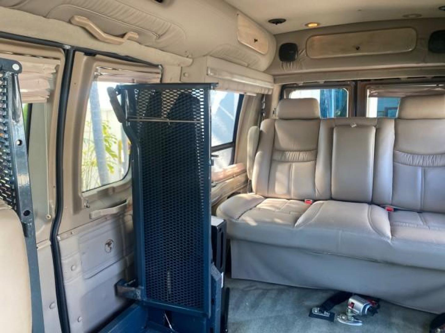 2006 Black /Medium Pebble Ford Econoline HI TOP E250 EXPLORER CONVERSION HANDICAP (1FDNE24L26H) with an 5.4L SOHC EFI V8 Triton Engine engine, Automatic transmission, located at 4701 North Dixie Hwy, Pompano Beach, FL, 33064, (954) 422-2889, 26.240938, -80.123474 - OUR WEBPAGE FLORIDACARS1.COM HAS OVER 100 PHOTOS AND FREE CARFAX LINK 2006 FORD ECONOLINE E250 EXPLORER CONVERSION HANDICAP $90,000 NEW VIN: 1FDNE24L26HA32770 1 F D N E 2 4 L 2 6 H A 3 2 7 7 0 VAN 5.4L V8 F GASOLINE REAR WHEEL DRIVE Features ABS Brakes Air Conditioning Alloy Wheels AM/FM Stereo Auto - Photo#72