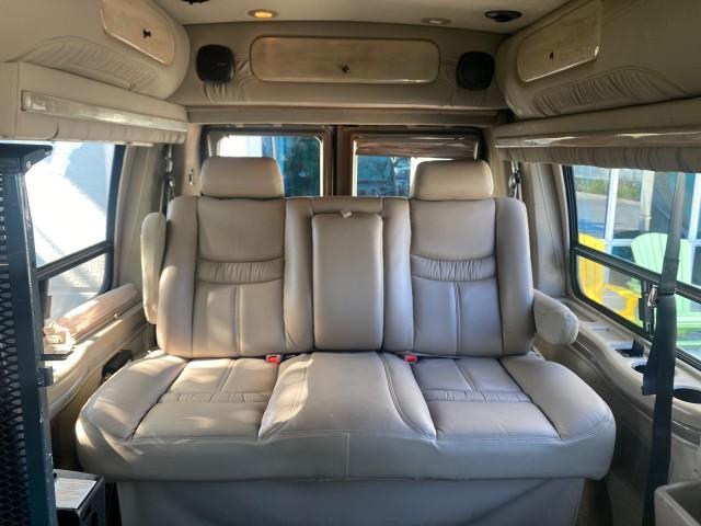 2006 Black /Medium Pebble Ford Econoline HI TOP E250 EXPLORER CONVERSION HANDICAP (1FDNE24L26H) with an 5.4L SOHC EFI V8 Triton Engine engine, Automatic transmission, located at 4701 North Dixie Hwy, Pompano Beach, FL, 33064, (954) 422-2889, 26.240938, -80.123474 - OUR WEBPAGE FLORIDACARS1.COM HAS OVER 100 PHOTOS AND FREE CARFAX LINK 2006 FORD ECONOLINE E250 EXPLORER CONVERSION HANDICAP $90,000 NEW VIN: 1FDNE24L26HA32770 1 F D N E 2 4 L 2 6 H A 3 2 7 7 0 VAN 5.4L V8 F GASOLINE REAR WHEEL DRIVE Features ABS Brakes Air Conditioning Alloy Wheels AM/FM Stereo Auto - Photo#74