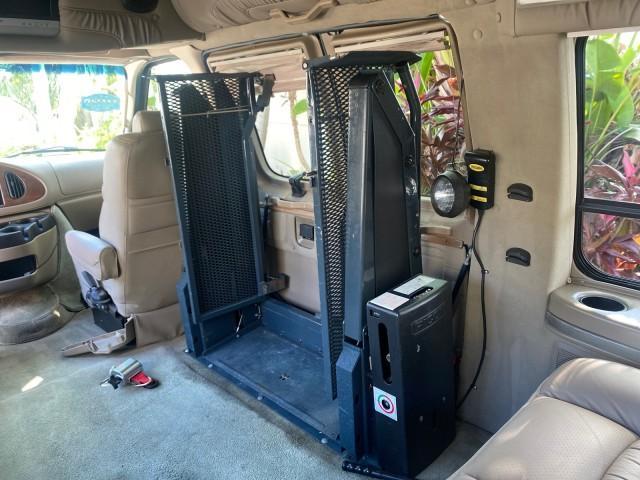 2006 Black /Medium Pebble Ford Econoline HI TOP E250 EXPLORER CONVERSION HANDICAP (1FDNE24L26H) with an 5.4L SOHC EFI V8 Triton Engine engine, Automatic transmission, located at 4701 North Dixie Hwy, Pompano Beach, FL, 33064, (954) 422-2889, 26.240938, -80.123474 - OUR WEBPAGE FLORIDACARS1.COM HAS OVER 100 PHOTOS AND FREE CARFAX LINK 2006 FORD ECONOLINE E250 EXPLORER CONVERSION HANDICAP $90,000 NEW VIN: 1FDNE24L26HA32770 1 F D N E 2 4 L 2 6 H A 3 2 7 7 0 VAN 5.4L V8 F GASOLINE REAR WHEEL DRIVE Features ABS Brakes Air Conditioning Alloy Wheels AM/FM Stereo Auto - Photo#80