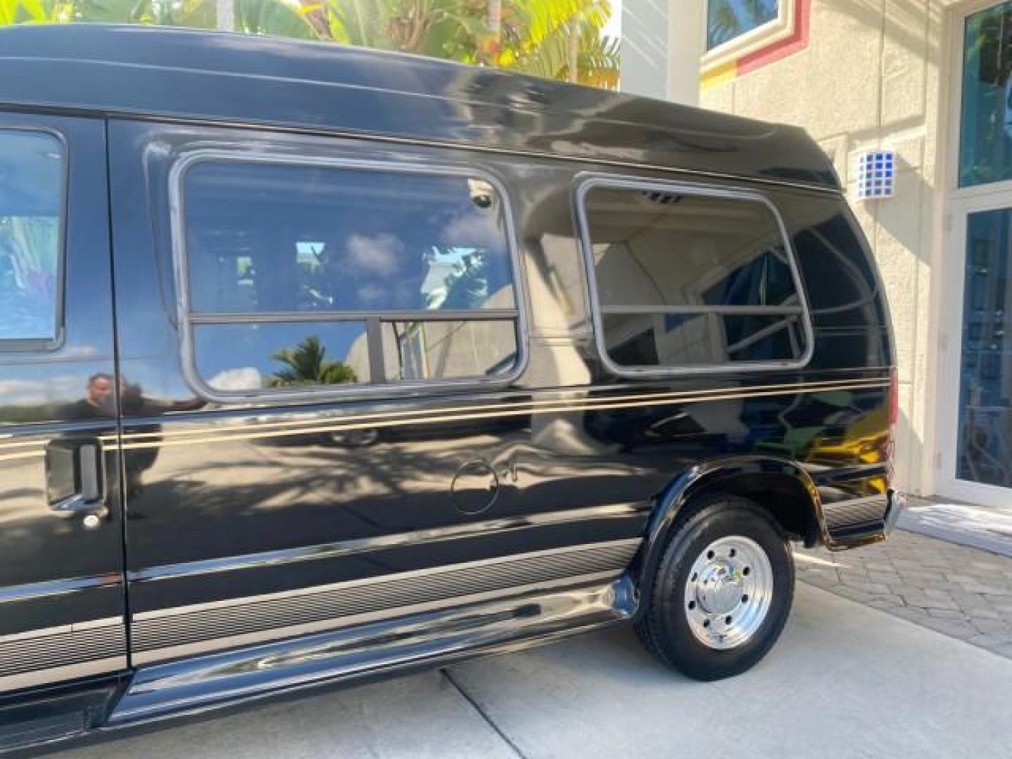 2006 Black /Medium Pebble Ford Econoline HI TOP E250 EXPLORER CONVERSION HANDICAP (1FDNE24L26H) with an 5.4L SOHC EFI V8 Triton Engine engine, Automatic transmission, located at 4701 North Dixie Hwy, Pompano Beach, FL, 33064, (954) 422-2889, 26.240938, -80.123474 - OUR WEBPAGE FLORIDACARS1.COM HAS OVER 100 PHOTOS AND FREE CARFAX LINK 2006 FORD ECONOLINE E250 EXPLORER CONVERSION HANDICAP $90,000 NEW VIN: 1FDNE24L26HA32770 1 F D N E 2 4 L 2 6 H A 3 2 7 7 0 VAN 5.4L V8 F GASOLINE REAR WHEEL DRIVE Features ABS Brakes Air Conditioning Alloy Wheels AM/FM Stereo Auto - Photo#84