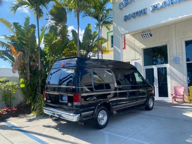 2006 Black /Medium Pebble Ford Econoline HI TOP E250 EXPLORER CONVERSION HANDICAP (1FDNE24L26H) with an 5.4L SOHC EFI V8 Triton Engine engine, Automatic transmission, located at 4701 North Dixie Hwy, Pompano Beach, FL, 33064, (954) 422-2889, 26.240938, -80.123474 - OUR WEBPAGE FLORIDACARS1.COM HAS OVER 100 PHOTOS AND FREE CARFAX LINK 2006 FORD ECONOLINE E250 EXPLORER CONVERSION HANDICAP $90,000 NEW VIN: 1FDNE24L26HA32770 1 F D N E 2 4 L 2 6 H A 3 2 7 7 0 VAN 5.4L V8 F GASOLINE REAR WHEEL DRIVE Features ABS Brakes Air Conditioning Alloy Wheels AM/FM Stereo Auto - Photo#99