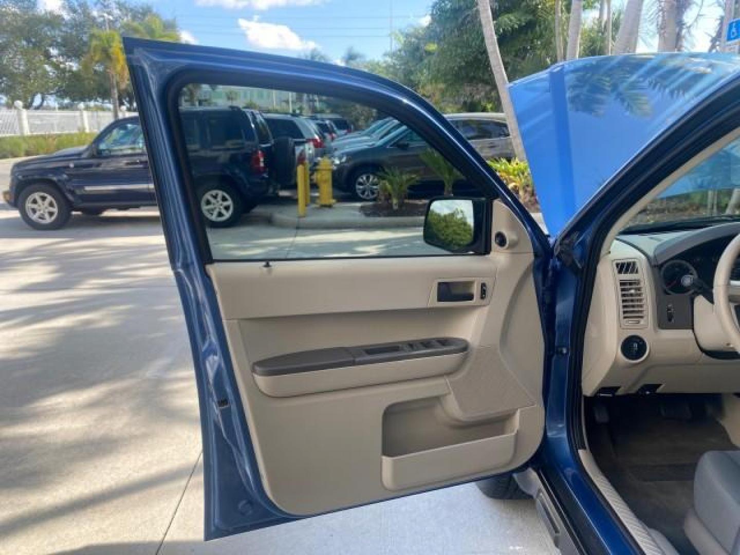 2009 Sport Blue Metallic /Stone Ford Escape XLS LOW MILES 25,482 (1FMCU02739K) with an 2.5L DOHC SEFI 16-Valve I4 Duratec Engine engine, Automatic transmission, located at 4701 North Dixie Hwy, Pompano Beach, FL, 33064, (954) 422-2889, 26.240938, -80.123474 - OUR WEBPAGE FLORIDACARS1.COM HAS OVER 100 PHOTOS AND FREE CARFAX LINK 2009 FORD ESCAPE XLS VIN: 1FMCU02739KA64641 1 F M C U 0 2 7 3 9 K A 6 4 6 4 1 4 DOOR WAGON/SPORT UTILITY 2.5L I4 F 16V GASOLINE 28 MPG FRONT WHEEL DRIVE Features ABS Brakes Air Conditioning Alloy Wheels AM/FM Stereo Automatic Tran - Photo#9