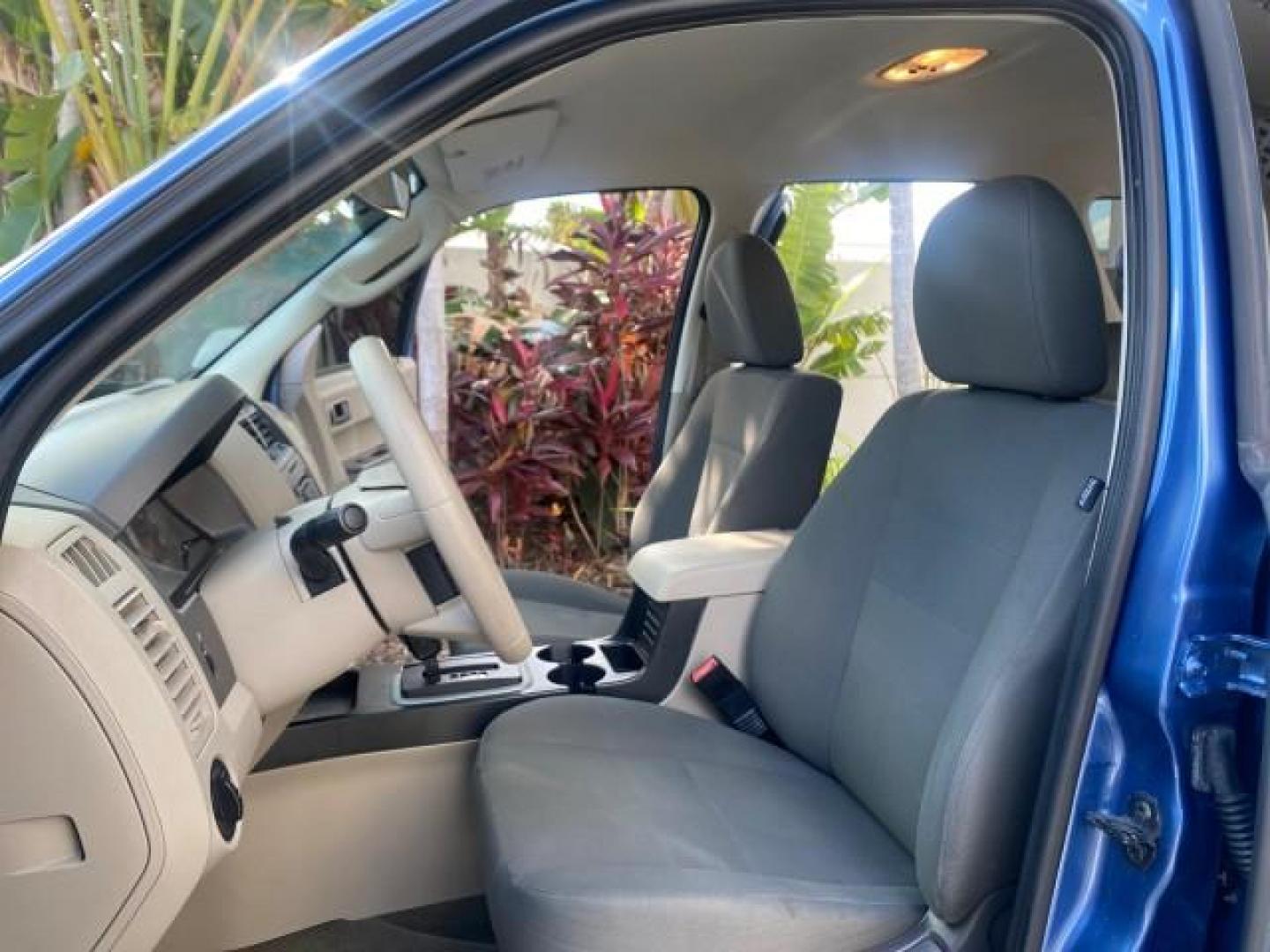 2009 Sport Blue Metallic /Stone Ford Escape XLS LOW MILES 25,482 (1FMCU02739K) with an 2.5L DOHC SEFI 16-Valve I4 Duratec Engine engine, Automatic transmission, located at 4701 North Dixie Hwy, Pompano Beach, FL, 33064, (954) 422-2889, 26.240938, -80.123474 - OUR WEBPAGE FLORIDACARS1.COM HAS OVER 100 PHOTOS AND FREE CARFAX LINK 2009 FORD ESCAPE XLS VIN: 1FMCU02739KA64641 1 F M C U 0 2 7 3 9 K A 6 4 6 4 1 4 DOOR WAGON/SPORT UTILITY 2.5L I4 F 16V GASOLINE 28 MPG FRONT WHEEL DRIVE Features ABS Brakes Air Conditioning Alloy Wheels AM/FM Stereo Automatic Tran - Photo#10