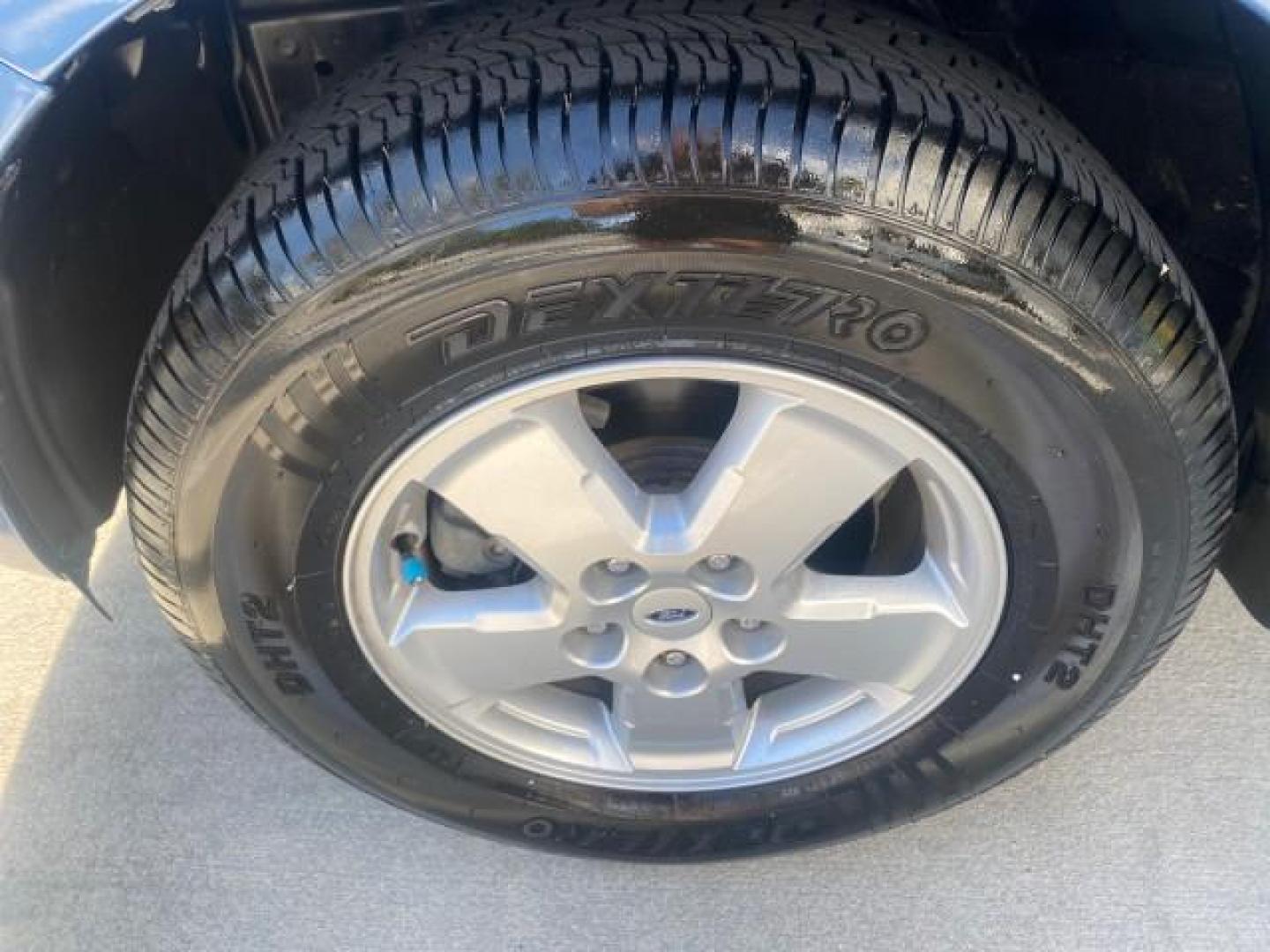 2009 Sport Blue Metallic /Stone Ford Escape XLS LOW MILES 25,482 (1FMCU02739K) with an 2.5L DOHC SEFI 16-Valve I4 Duratec Engine engine, Automatic transmission, located at 4701 North Dixie Hwy, Pompano Beach, FL, 33064, (954) 422-2889, 26.240938, -80.123474 - OUR WEBPAGE FLORIDACARS1.COM HAS OVER 100 PHOTOS AND FREE CARFAX LINK 2009 FORD ESCAPE XLS VIN: 1FMCU02739KA64641 1 F M C U 0 2 7 3 9 K A 6 4 6 4 1 4 DOOR WAGON/SPORT UTILITY 2.5L I4 F 16V GASOLINE 28 MPG FRONT WHEEL DRIVE Features ABS Brakes Air Conditioning Alloy Wheels AM/FM Stereo Automatic Tran - Photo#19