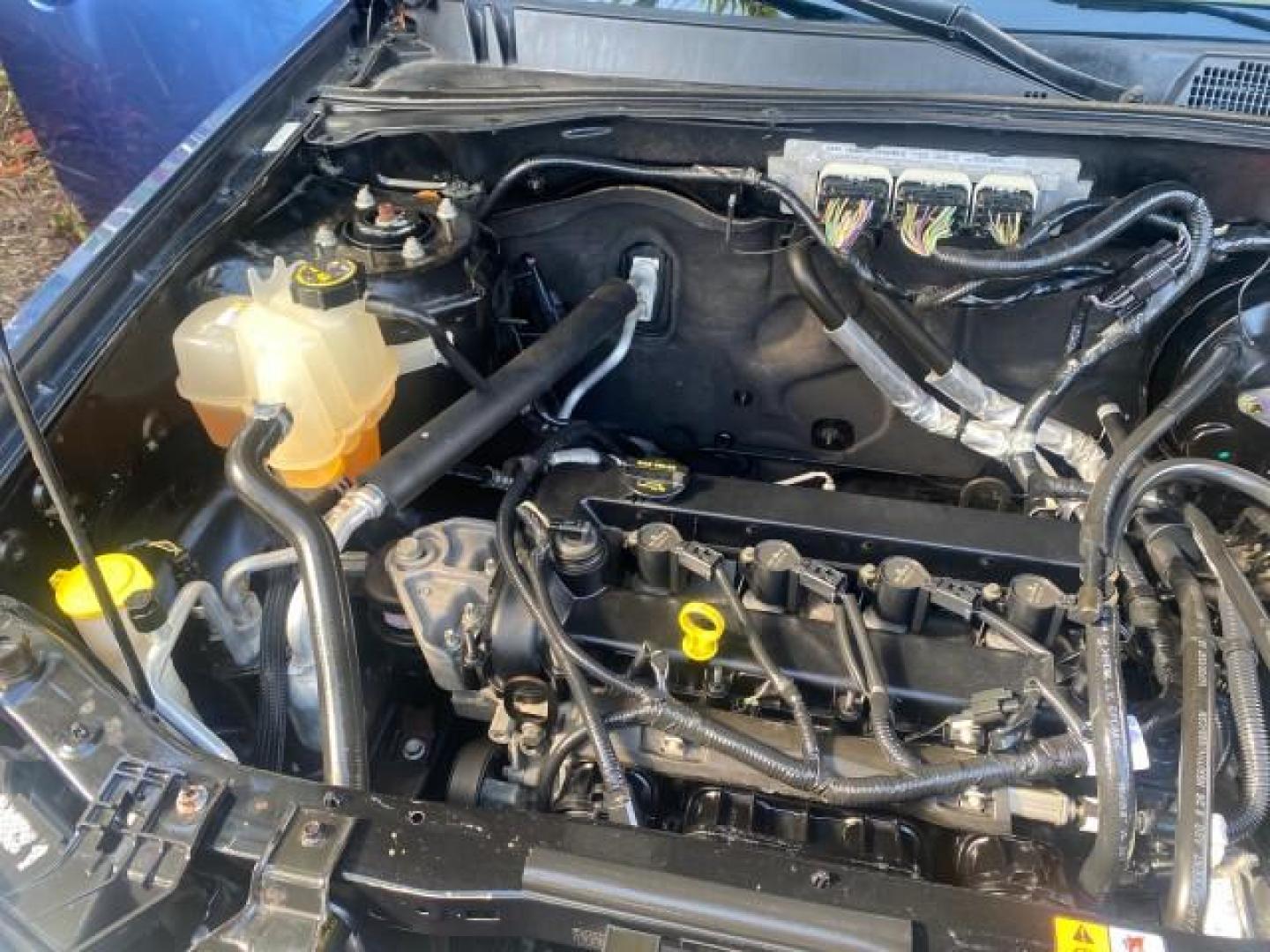 2009 Sport Blue Metallic /Stone Ford Escape XLS LOW MILES 25,482 (1FMCU02739K) with an 2.5L DOHC SEFI 16-Valve I4 Duratec Engine engine, Automatic transmission, located at 4701 North Dixie Hwy, Pompano Beach, FL, 33064, (954) 422-2889, 26.240938, -80.123474 - OUR WEBPAGE FLORIDACARS1.COM HAS OVER 100 PHOTOS AND FREE CARFAX LINK 2009 FORD ESCAPE XLS VIN: 1FMCU02739KA64641 1 F M C U 0 2 7 3 9 K A 6 4 6 4 1 4 DOOR WAGON/SPORT UTILITY 2.5L I4 F 16V GASOLINE 28 MPG FRONT WHEEL DRIVE Features ABS Brakes Air Conditioning Alloy Wheels AM/FM Stereo Automatic Tran - Photo#25