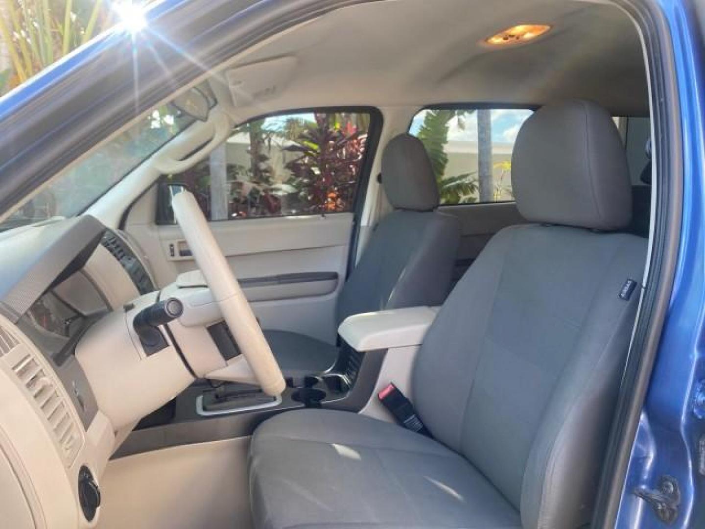 2009 Sport Blue Metallic /Stone Ford Escape XLS LOW MILES 25,482 (1FMCU02739K) with an 2.5L DOHC SEFI 16-Valve I4 Duratec Engine engine, Automatic transmission, located at 4701 North Dixie Hwy, Pompano Beach, FL, 33064, (954) 422-2889, 26.240938, -80.123474 - OUR WEBPAGE FLORIDACARS1.COM HAS OVER 100 PHOTOS AND FREE CARFAX LINK 2009 FORD ESCAPE XLS VIN: 1FMCU02739KA64641 1 F M C U 0 2 7 3 9 K A 6 4 6 4 1 4 DOOR WAGON/SPORT UTILITY 2.5L I4 F 16V GASOLINE 28 MPG FRONT WHEEL DRIVE Features ABS Brakes Air Conditioning Alloy Wheels AM/FM Stereo Automatic Tran - Photo#44