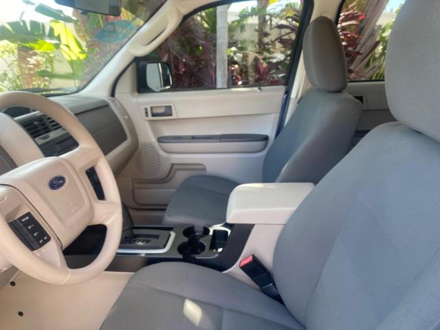 2009 Sport Blue Metallic /Stone Ford Escape XLS LOW MILES 25,482 (1FMCU02739K) with an 2.5L DOHC SEFI 16-Valve I4 Duratec Engine engine, Automatic transmission, located at 4701 North Dixie Hwy, Pompano Beach, FL, 33064, (954) 422-2889, 26.240938, -80.123474 - OUR WEBPAGE FLORIDACARS1.COM HAS OVER 100 PHOTOS AND FREE CARFAX LINK 2009 FORD ESCAPE XLS VIN: 1FMCU02739KA64641 1 F M C U 0 2 7 3 9 K A 6 4 6 4 1 4 DOOR WAGON/SPORT UTILITY 2.5L I4 F 16V GASOLINE 28 MPG FRONT WHEEL DRIVE Features ABS Brakes Air Conditioning Alloy Wheels AM/FM Stereo Automatic Tran - Photo#46