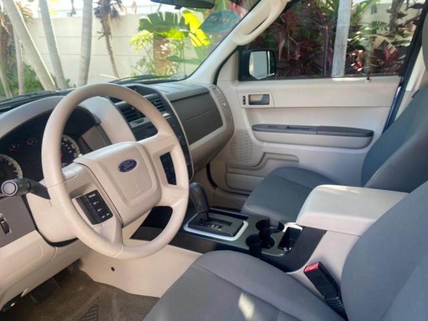2009 Sport Blue Metallic /Stone Ford Escape XLS LOW MILES 25,482 (1FMCU02739K) with an 2.5L DOHC SEFI 16-Valve I4 Duratec Engine engine, Automatic transmission, located at 4701 North Dixie Hwy, Pompano Beach, FL, 33064, (954) 422-2889, 26.240938, -80.123474 - OUR WEBPAGE FLORIDACARS1.COM HAS OVER 100 PHOTOS AND FREE CARFAX LINK 2009 FORD ESCAPE XLS VIN: 1FMCU02739KA64641 1 F M C U 0 2 7 3 9 K A 6 4 6 4 1 4 DOOR WAGON/SPORT UTILITY 2.5L I4 F 16V GASOLINE 28 MPG FRONT WHEEL DRIVE Features ABS Brakes Air Conditioning Alloy Wheels AM/FM Stereo Automatic Tran - Photo#47