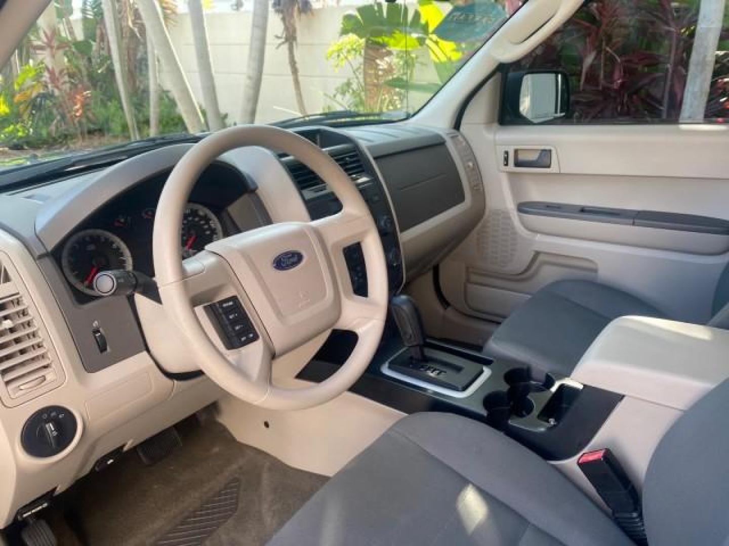 2009 Sport Blue Metallic /Stone Ford Escape XLS LOW MILES 25,482 (1FMCU02739K) with an 2.5L DOHC SEFI 16-Valve I4 Duratec Engine engine, Automatic transmission, located at 4701 North Dixie Hwy, Pompano Beach, FL, 33064, (954) 422-2889, 26.240938, -80.123474 - OUR WEBPAGE FLORIDACARS1.COM HAS OVER 100 PHOTOS AND FREE CARFAX LINK 2009 FORD ESCAPE XLS VIN: 1FMCU02739KA64641 1 F M C U 0 2 7 3 9 K A 6 4 6 4 1 4 DOOR WAGON/SPORT UTILITY 2.5L I4 F 16V GASOLINE 28 MPG FRONT WHEEL DRIVE Features ABS Brakes Air Conditioning Alloy Wheels AM/FM Stereo Automatic Tran - Photo#48