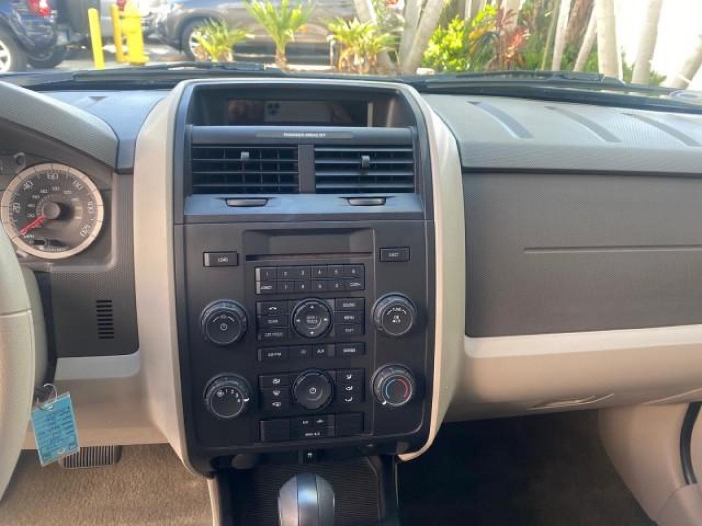2009 Sport Blue Metallic /Stone Ford Escape XLS LOW MILES 25,482 (1FMCU02739K) with an 2.5L DOHC SEFI 16-Valve I4 Duratec Engine engine, Automatic transmission, located at 4701 North Dixie Hwy, Pompano Beach, FL, 33064, (954) 422-2889, 26.240938, -80.123474 - OUR WEBPAGE FLORIDACARS1.COM HAS OVER 100 PHOTOS AND FREE CARFAX LINK 2009 FORD ESCAPE XLS VIN: 1FMCU02739KA64641 1 F M C U 0 2 7 3 9 K A 6 4 6 4 1 4 DOOR WAGON/SPORT UTILITY 2.5L I4 F 16V GASOLINE 28 MPG FRONT WHEEL DRIVE Features ABS Brakes Air Conditioning Alloy Wheels AM/FM Stereo Automatic Tran - Photo#56