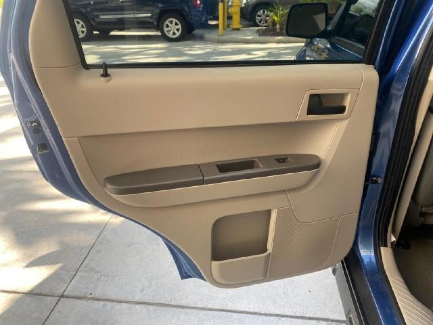 2009 Sport Blue Metallic /Stone Ford Escape XLS LOW MILES 25,482 (1FMCU02739K) with an 2.5L DOHC SEFI 16-Valve I4 Duratec Engine engine, Automatic transmission, located at 4701 North Dixie Hwy, Pompano Beach, FL, 33064, (954) 422-2889, 26.240938, -80.123474 - OUR WEBPAGE FLORIDACARS1.COM HAS OVER 100 PHOTOS AND FREE CARFAX LINK 2009 FORD ESCAPE XLS VIN: 1FMCU02739KA64641 1 F M C U 0 2 7 3 9 K A 6 4 6 4 1 4 DOOR WAGON/SPORT UTILITY 2.5L I4 F 16V GASOLINE 28 MPG FRONT WHEEL DRIVE Features ABS Brakes Air Conditioning Alloy Wheels AM/FM Stereo Automatic Tran - Photo#73