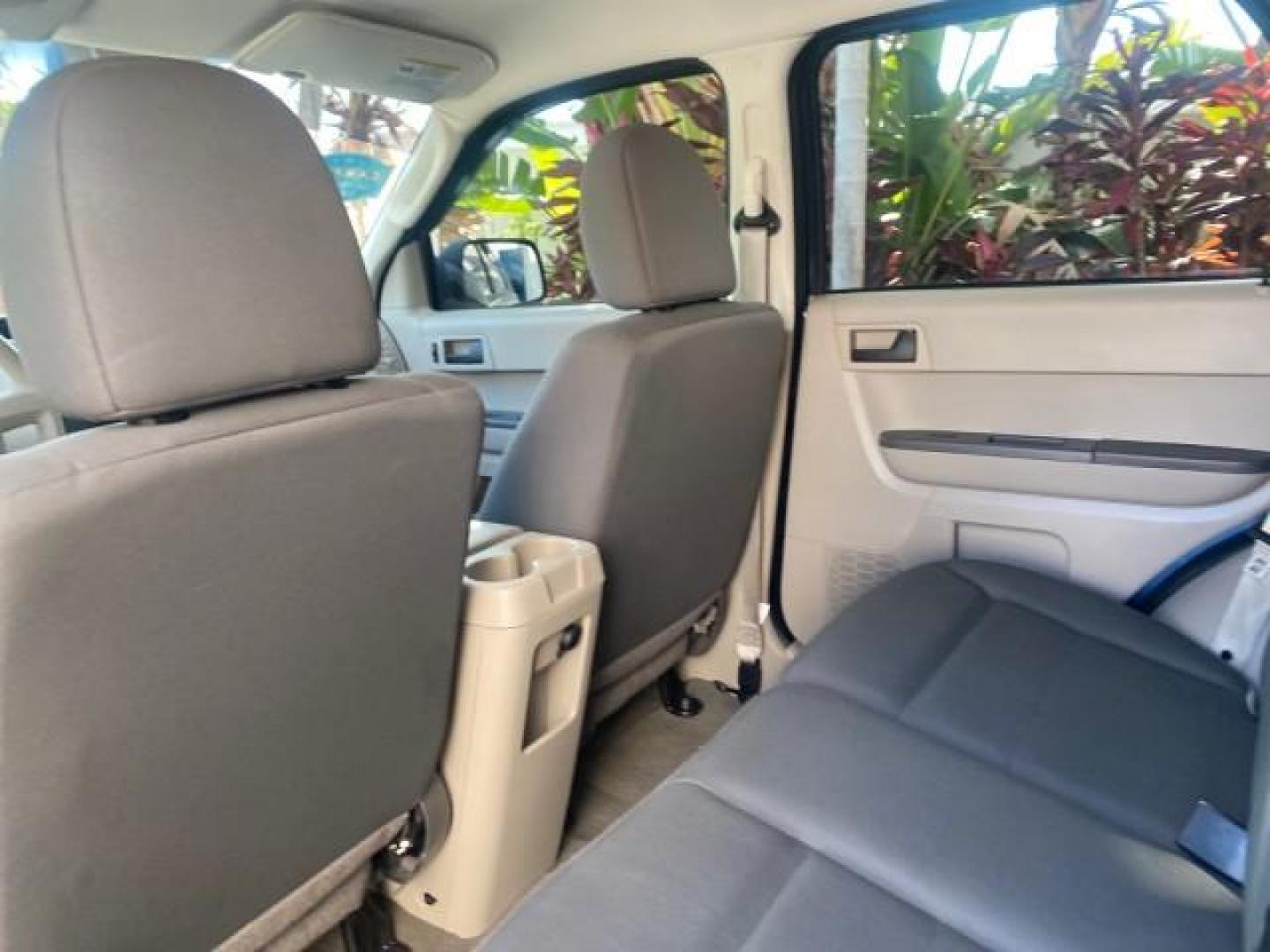 2009 Sport Blue Metallic /Stone Ford Escape XLS LOW MILES 25,482 (1FMCU02739K) with an 2.5L DOHC SEFI 16-Valve I4 Duratec Engine engine, Automatic transmission, located at 4701 North Dixie Hwy, Pompano Beach, FL, 33064, (954) 422-2889, 26.240938, -80.123474 - OUR WEBPAGE FLORIDACARS1.COM HAS OVER 100 PHOTOS AND FREE CARFAX LINK 2009 FORD ESCAPE XLS VIN: 1FMCU02739KA64641 1 F M C U 0 2 7 3 9 K A 6 4 6 4 1 4 DOOR WAGON/SPORT UTILITY 2.5L I4 F 16V GASOLINE 28 MPG FRONT WHEEL DRIVE Features ABS Brakes Air Conditioning Alloy Wheels AM/FM Stereo Automatic Tran - Photo#77