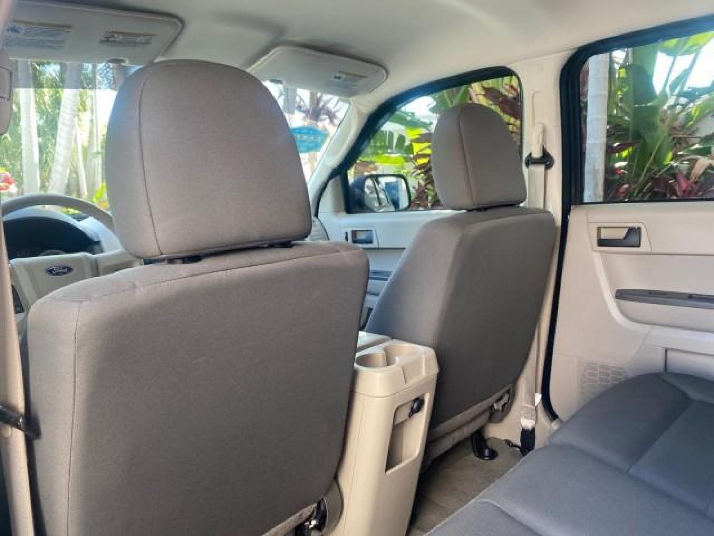 2009 Sport Blue Metallic /Stone Ford Escape XLS LOW MILES 25,482 (1FMCU02739K) with an 2.5L DOHC SEFI 16-Valve I4 Duratec Engine engine, Automatic transmission, located at 4701 North Dixie Hwy, Pompano Beach, FL, 33064, (954) 422-2889, 26.240938, -80.123474 - OUR WEBPAGE FLORIDACARS1.COM HAS OVER 100 PHOTOS AND FREE CARFAX LINK 2009 FORD ESCAPE XLS VIN: 1FMCU02739KA64641 1 F M C U 0 2 7 3 9 K A 6 4 6 4 1 4 DOOR WAGON/SPORT UTILITY 2.5L I4 F 16V GASOLINE 28 MPG FRONT WHEEL DRIVE Features ABS Brakes Air Conditioning Alloy Wheels AM/FM Stereo Automatic Tran - Photo#78