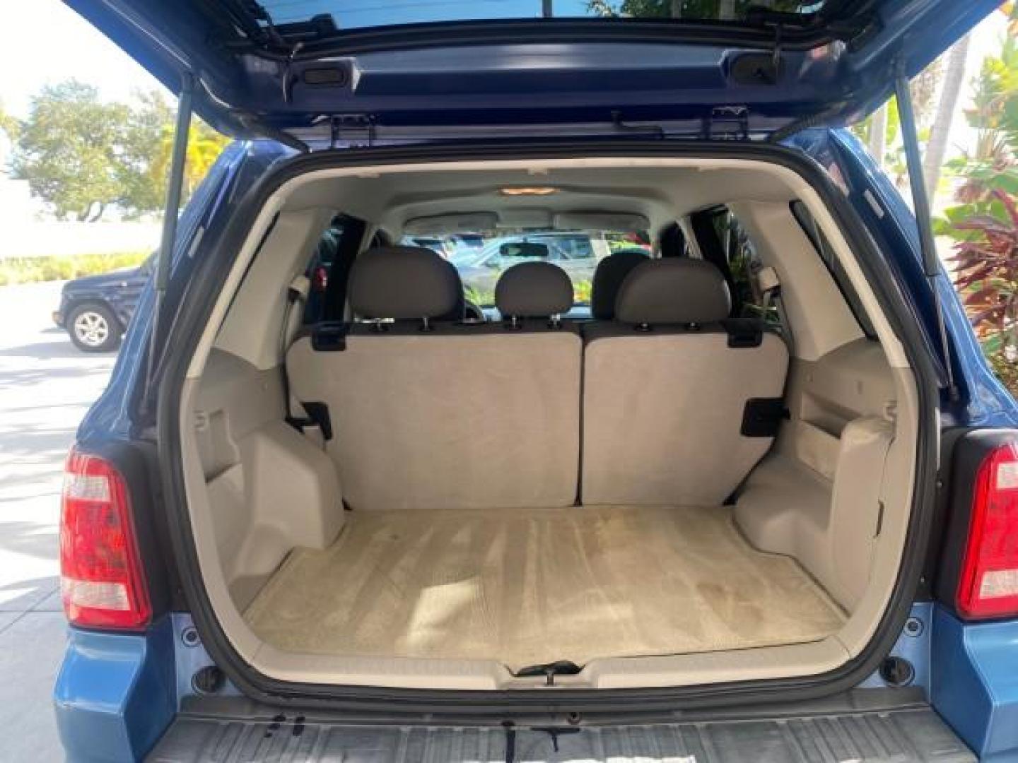 2009 Sport Blue Metallic /Stone Ford Escape XLS LOW MILES 25,482 (1FMCU02739K) with an 2.5L DOHC SEFI 16-Valve I4 Duratec Engine engine, Automatic transmission, located at 4701 North Dixie Hwy, Pompano Beach, FL, 33064, (954) 422-2889, 26.240938, -80.123474 - OUR WEBPAGE FLORIDACARS1.COM HAS OVER 100 PHOTOS AND FREE CARFAX LINK 2009 FORD ESCAPE XLS VIN: 1FMCU02739KA64641 1 F M C U 0 2 7 3 9 K A 6 4 6 4 1 4 DOOR WAGON/SPORT UTILITY 2.5L I4 F 16V GASOLINE 28 MPG FRONT WHEEL DRIVE Features ABS Brakes Air Conditioning Alloy Wheels AM/FM Stereo Automatic Tran - Photo#91