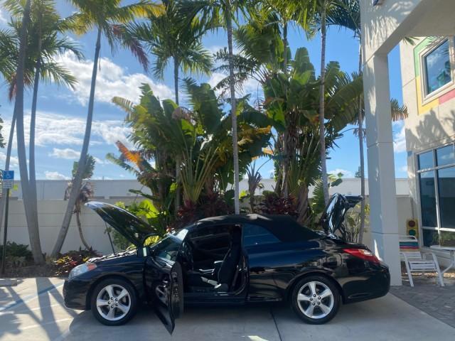 2006 Black /Dark Stone Toyota Camry Solara SE V6 CONV LOW MILES 57,572 (4T1FA38P16U) with an 3.3L DOHC SMPI 24-Valve V6 Engine engine, Automatic transmission, located at 4701 North Dixie Hwy, Pompano Beach, FL, 33064, (954) 422-2889, 26.240938, -80.123474 - OUR WEBPAGE FLORIDACARS1.COM HAS OVER 100 PHOTOS AND FREE CARFAX LINK 2006 TOYOTA CAMRY SOLARA SE V6 VIN: 4T1FA38P16U086295 4 T 1 F A 3 8 P 1 6 U 0 8 6 2 9 5 CONVERTIBLE 3.3L V6 F DOHC 24V GASOLINE 29 MPG FRONT WHEEL DRIVE Features ABS Brakes Air Conditioning Alloy Wheels AM/FM Stereo Automatic Tran - Photo#8