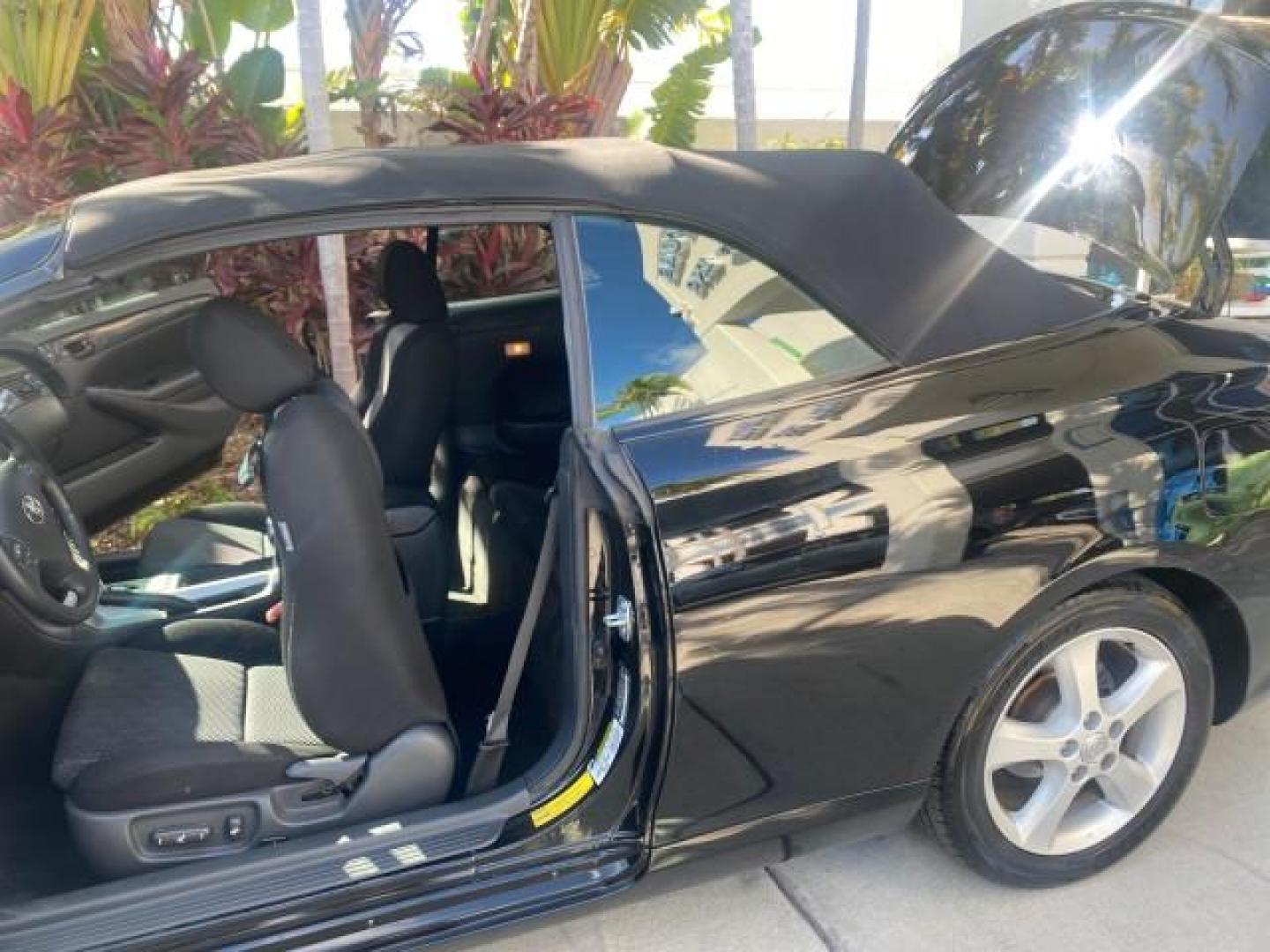2006 Black /Dark Stone Toyota Camry Solara SE V6 CONV LOW MILES 57,572 (4T1FA38P16U) with an 3.3L DOHC SMPI 24-Valve V6 Engine engine, Automatic transmission, located at 4701 North Dixie Hwy, Pompano Beach, FL, 33064, (954) 422-2889, 26.240938, -80.123474 - OUR WEBPAGE FLORIDACARS1.COM HAS OVER 100 PHOTOS AND FREE CARFAX LINK 2006 TOYOTA CAMRY SOLARA SE V6 VIN: 4T1FA38P16U086295 4 T 1 F A 3 8 P 1 6 U 0 8 6 2 9 5 CONVERTIBLE 3.3L V6 F DOHC 24V GASOLINE 29 MPG FRONT WHEEL DRIVE Features ABS Brakes Air Conditioning Alloy Wheels AM/FM Stereo Automatic Tran - Photo#13