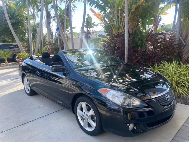 2006 Black /Dark Stone Toyota Camry Solara SE V6 CONV LOW MILES 57,572 (4T1FA38P16U) with an 3.3L DOHC SMPI 24-Valve V6 Engine engine, Automatic transmission, located at 4701 North Dixie Hwy, Pompano Beach, FL, 33064, (954) 422-2889, 26.240938, -80.123474 - OUR WEBPAGE FLORIDACARS1.COM HAS OVER 100 PHOTOS AND FREE CARFAX LINK 2006 TOYOTA CAMRY SOLARA SE V6 VIN: 4T1FA38P16U086295 4 T 1 F A 3 8 P 1 6 U 0 8 6 2 9 5 CONVERTIBLE 3.3L V6 F DOHC 24V GASOLINE 29 MPG FRONT WHEEL DRIVE Features ABS Brakes Air Conditioning Alloy Wheels AM/FM Stereo Automatic Tran - Photo#24