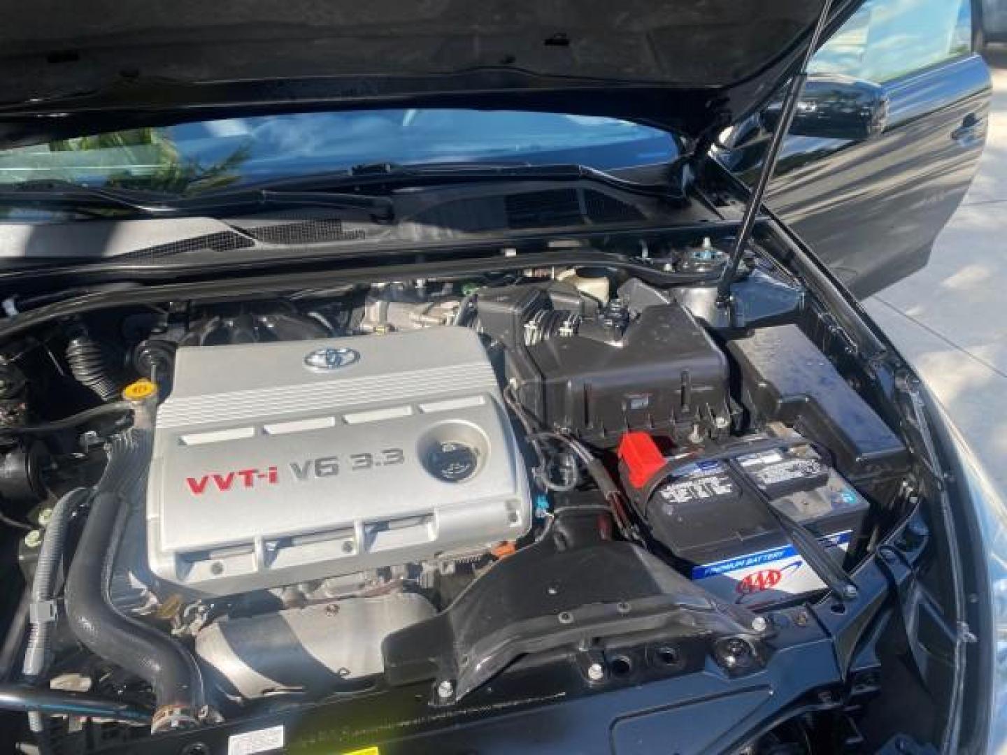 2006 Black /Dark Stone Toyota Camry Solara SE V6 CONV LOW MILES 57,572 (4T1FA38P16U) with an 3.3L DOHC SMPI 24-Valve V6 Engine engine, Automatic transmission, located at 4701 North Dixie Hwy, Pompano Beach, FL, 33064, (954) 422-2889, 26.240938, -80.123474 - OUR WEBPAGE FLORIDACARS1.COM HAS OVER 100 PHOTOS AND FREE CARFAX LINK 2006 TOYOTA CAMRY SOLARA SE V6 VIN: 4T1FA38P16U086295 4 T 1 F A 3 8 P 1 6 U 0 8 6 2 9 5 CONVERTIBLE 3.3L V6 F DOHC 24V GASOLINE 29 MPG FRONT WHEEL DRIVE Features ABS Brakes Air Conditioning Alloy Wheels AM/FM Stereo Automatic Tran - Photo#26