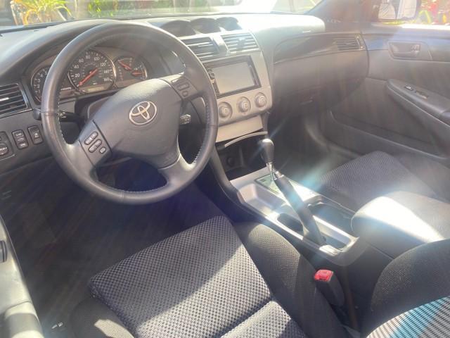 2006 Black /Dark Stone Toyota Camry Solara SE V6 CONV LOW MILES 57,572 (4T1FA38P16U) with an 3.3L DOHC SMPI 24-Valve V6 Engine engine, Automatic transmission, located at 4701 North Dixie Hwy, Pompano Beach, FL, 33064, (954) 422-2889, 26.240938, -80.123474 - OUR WEBPAGE FLORIDACARS1.COM HAS OVER 100 PHOTOS AND FREE CARFAX LINK 2006 TOYOTA CAMRY SOLARA SE V6 VIN: 4T1FA38P16U086295 4 T 1 F A 3 8 P 1 6 U 0 8 6 2 9 5 CONVERTIBLE 3.3L V6 F DOHC 24V GASOLINE 29 MPG FRONT WHEEL DRIVE Features ABS Brakes Air Conditioning Alloy Wheels AM/FM Stereo Automatic Tran - Photo#41