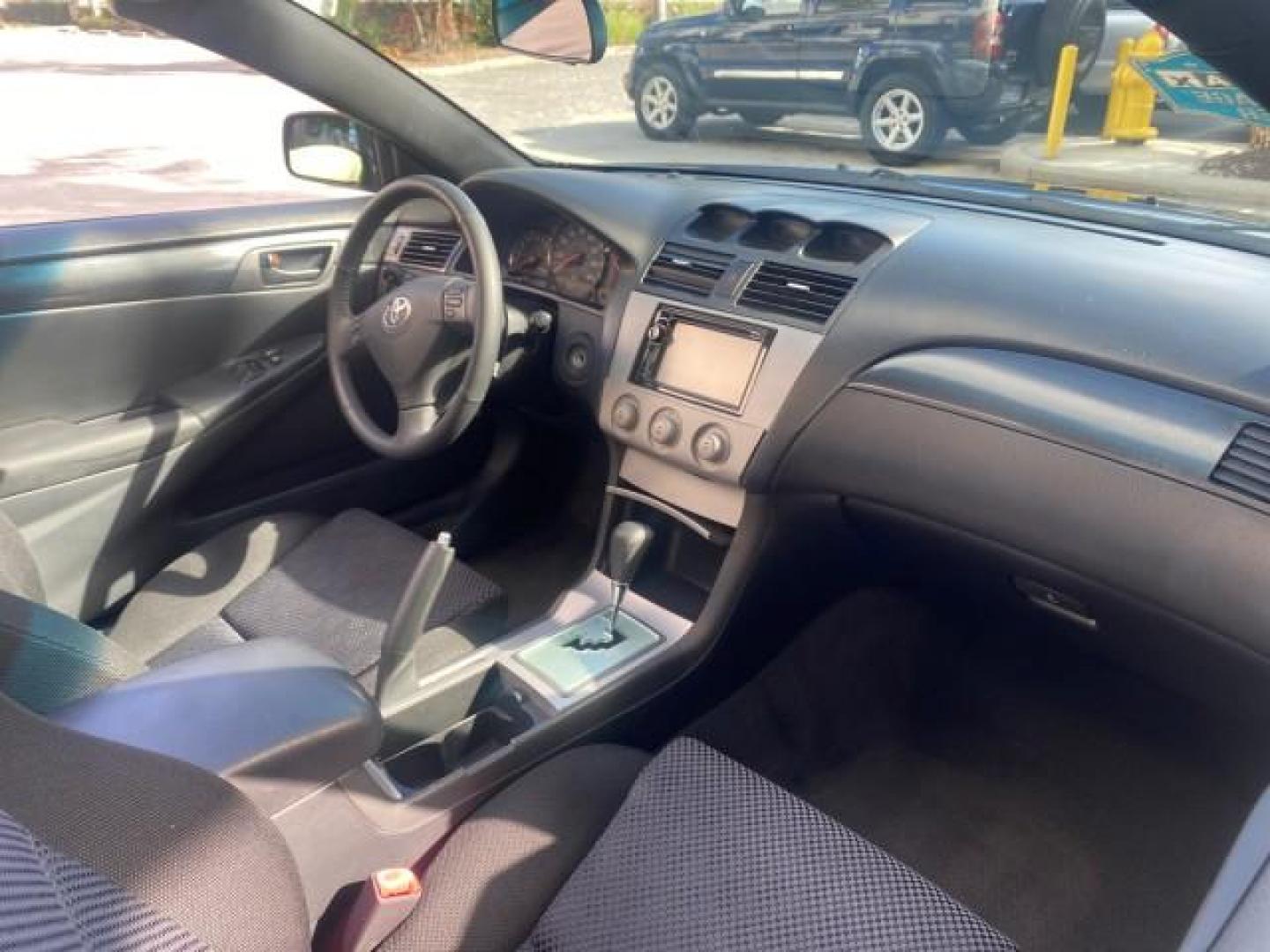 2006 Black /Dark Stone Toyota Camry Solara SE V6 CONV LOW MILES 57,572 (4T1FA38P16U) with an 3.3L DOHC SMPI 24-Valve V6 Engine engine, Automatic transmission, located at 4701 North Dixie Hwy, Pompano Beach, FL, 33064, (954) 422-2889, 26.240938, -80.123474 - OUR WEBPAGE FLORIDACARS1.COM HAS OVER 100 PHOTOS AND FREE CARFAX LINK 2006 TOYOTA CAMRY SOLARA SE V6 VIN: 4T1FA38P16U086295 4 T 1 F A 3 8 P 1 6 U 0 8 6 2 9 5 CONVERTIBLE 3.3L V6 F DOHC 24V GASOLINE 29 MPG FRONT WHEEL DRIVE Features ABS Brakes Air Conditioning Alloy Wheels AM/FM Stereo Automatic Tran - Photo#43