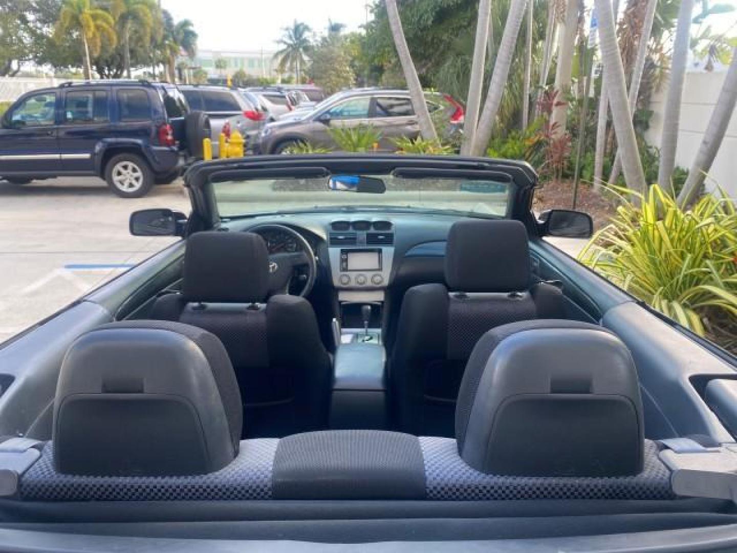 2006 Black /Dark Stone Toyota Camry Solara SE V6 CONV LOW MILES 57,572 (4T1FA38P16U) with an 3.3L DOHC SMPI 24-Valve V6 Engine engine, Automatic transmission, located at 4701 North Dixie Hwy, Pompano Beach, FL, 33064, (954) 422-2889, 26.240938, -80.123474 - OUR WEBPAGE FLORIDACARS1.COM HAS OVER 100 PHOTOS AND FREE CARFAX LINK 2006 TOYOTA CAMRY SOLARA SE V6 VIN: 4T1FA38P16U086295 4 T 1 F A 3 8 P 1 6 U 0 8 6 2 9 5 CONVERTIBLE 3.3L V6 F DOHC 24V GASOLINE 29 MPG FRONT WHEEL DRIVE Features ABS Brakes Air Conditioning Alloy Wheels AM/FM Stereo Automatic Tran - Photo#46