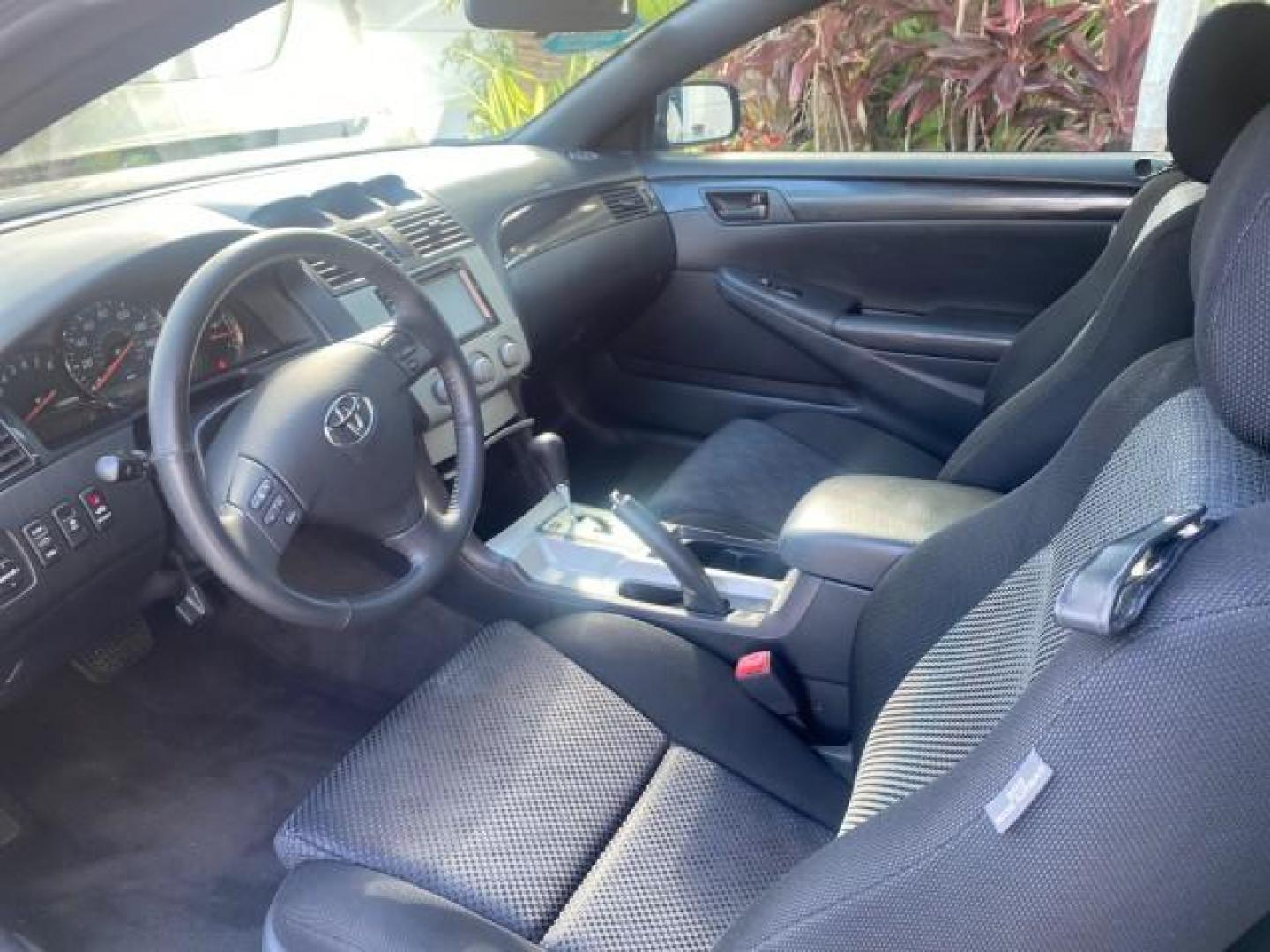 2006 Black /Dark Stone Toyota Camry Solara SE V6 CONV LOW MILES 57,572 (4T1FA38P16U) with an 3.3L DOHC SMPI 24-Valve V6 Engine engine, Automatic transmission, located at 4701 North Dixie Hwy, Pompano Beach, FL, 33064, (954) 422-2889, 26.240938, -80.123474 - OUR WEBPAGE FLORIDACARS1.COM HAS OVER 100 PHOTOS AND FREE CARFAX LINK 2006 TOYOTA CAMRY SOLARA SE V6 VIN: 4T1FA38P16U086295 4 T 1 F A 3 8 P 1 6 U 0 8 6 2 9 5 CONVERTIBLE 3.3L V6 F DOHC 24V GASOLINE 29 MPG FRONT WHEEL DRIVE Features ABS Brakes Air Conditioning Alloy Wheels AM/FM Stereo Automatic Tran - Photo#56