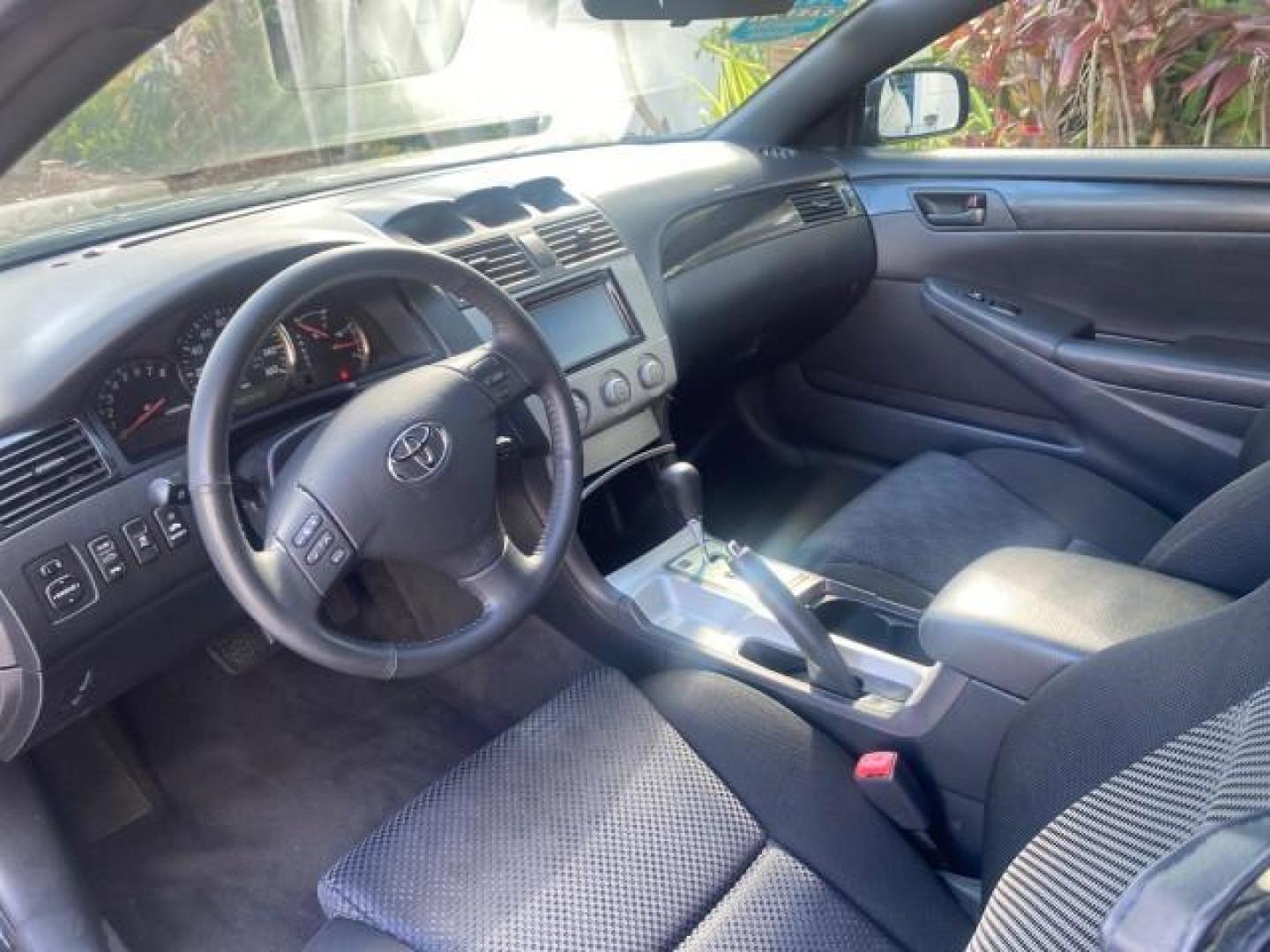 2006 Black /Dark Stone Toyota Camry Solara SE V6 CONV LOW MILES 57,572 (4T1FA38P16U) with an 3.3L DOHC SMPI 24-Valve V6 Engine engine, Automatic transmission, located at 4701 North Dixie Hwy, Pompano Beach, FL, 33064, (954) 422-2889, 26.240938, -80.123474 - OUR WEBPAGE FLORIDACARS1.COM HAS OVER 100 PHOTOS AND FREE CARFAX LINK 2006 TOYOTA CAMRY SOLARA SE V6 VIN: 4T1FA38P16U086295 4 T 1 F A 3 8 P 1 6 U 0 8 6 2 9 5 CONVERTIBLE 3.3L V6 F DOHC 24V GASOLINE 29 MPG FRONT WHEEL DRIVE Features ABS Brakes Air Conditioning Alloy Wheels AM/FM Stereo Automatic Tran - Photo#58