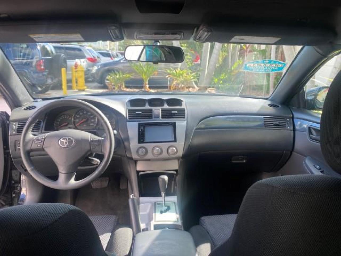 2006 Black /Dark Stone Toyota Camry Solara SE V6 CONV LOW MILES 57,572 (4T1FA38P16U) with an 3.3L DOHC SMPI 24-Valve V6 Engine engine, Automatic transmission, located at 4701 North Dixie Hwy, Pompano Beach, FL, 33064, (954) 422-2889, 26.240938, -80.123474 - OUR WEBPAGE FLORIDACARS1.COM HAS OVER 100 PHOTOS AND FREE CARFAX LINK 2006 TOYOTA CAMRY SOLARA SE V6 VIN: 4T1FA38P16U086295 4 T 1 F A 3 8 P 1 6 U 0 8 6 2 9 5 CONVERTIBLE 3.3L V6 F DOHC 24V GASOLINE 29 MPG FRONT WHEEL DRIVE Features ABS Brakes Air Conditioning Alloy Wheels AM/FM Stereo Automatic Tran - Photo#88