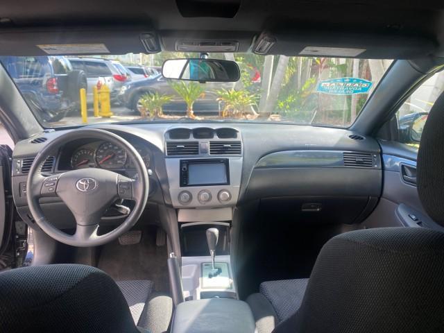 2006 Black /Dark Stone Toyota Camry Solara SE V6 CONV LOW MILES 57,572 (4T1FA38P16U) with an 3.3L DOHC SMPI 24-Valve V6 Engine engine, Automatic transmission, located at 4701 North Dixie Hwy, Pompano Beach, FL, 33064, (954) 422-2889, 26.240938, -80.123474 - OUR WEBPAGE FLORIDACARS1.COM HAS OVER 100 PHOTOS AND FREE CARFAX LINK 2006 TOYOTA CAMRY SOLARA SE V6 VIN: 4T1FA38P16U086295 4 T 1 F A 3 8 P 1 6 U 0 8 6 2 9 5 CONVERTIBLE 3.3L V6 F DOHC 24V GASOLINE 29 MPG FRONT WHEEL DRIVE Features ABS Brakes Air Conditioning Alloy Wheels AM/FM Stereo Automatic Tran - Photo#88