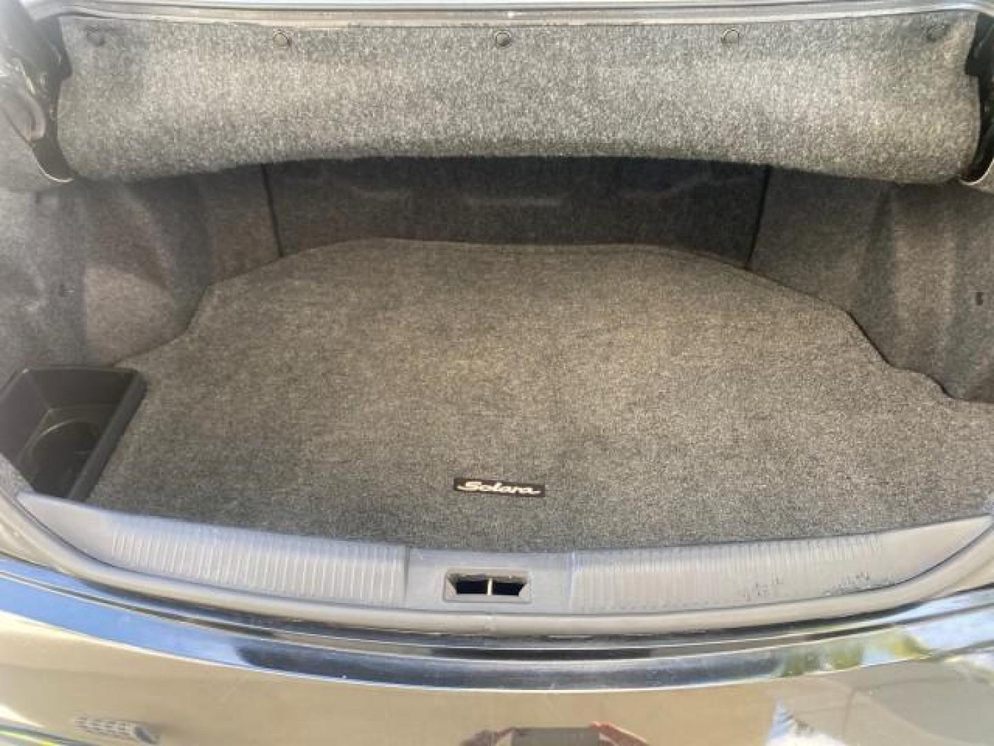 2006 Black /Dark Stone Toyota Camry Solara SE V6 CONV LOW MILES 57,572 (4T1FA38P16U) with an 3.3L DOHC SMPI 24-Valve V6 Engine engine, Automatic transmission, located at 4701 North Dixie Hwy, Pompano Beach, FL, 33064, (954) 422-2889, 26.240938, -80.123474 - OUR WEBPAGE FLORIDACARS1.COM HAS OVER 100 PHOTOS AND FREE CARFAX LINK 2006 TOYOTA CAMRY SOLARA SE V6 VIN: 4T1FA38P16U086295 4 T 1 F A 3 8 P 1 6 U 0 8 6 2 9 5 CONVERTIBLE 3.3L V6 F DOHC 24V GASOLINE 29 MPG FRONT WHEEL DRIVE Features ABS Brakes Air Conditioning Alloy Wheels AM/FM Stereo Automatic Tran - Photo#99