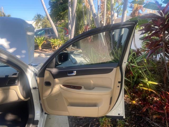 2012 White Satin Pearl /Saddle Hyundai Genesis 4.6L V8 LOW MILES PEARL WHITE (KMHGC4DF6CU) with an 4.6L DOHC MPI 32-Valve V8 Engine engine, Automatic transmission, located at 4701 North Dixie Hwy, Pompano Beach, FL, 33064, (954) 422-2889, 26.240938, -80.123474 - OUR WEBPAGE FLORIDACARS1.COM HAS OVER 100 PHOTOS AND FREE CARFAX LINK 2012 HYUNDAI GENESIS 4.6L V8 THIS CAR IS LOADED WITH EVERY OPTION POSSIBLE NEW $44,500 VIN: KMHGC4DF6CU166625 K M H G C 4 D F 6 C U 1 6 6 6 2 5 SEDAN 4 DR 4.6L V8 F DOHC 32V GASOLINE 25 MPG REAR WHEEL DRIVE Features A/C Seat(s) AB - Photo#11