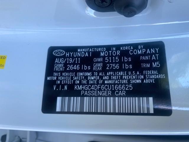 2012 White Satin Pearl /Saddle Hyundai Genesis 4.6L V8 LOW MILES PEARL WHITE (KMHGC4DF6CU) with an 4.6L DOHC MPI 32-Valve V8 Engine engine, Automatic transmission, located at 4701 North Dixie Hwy, Pompano Beach, FL, 33064, (954) 422-2889, 26.240938, -80.123474 - OUR WEBPAGE FLORIDACARS1.COM HAS OVER 100 PHOTOS AND FREE CARFAX LINK 2012 HYUNDAI GENESIS 4.6L V8 THIS CAR IS LOADED WITH EVERY OPTION POSSIBLE NEW $44,500 VIN: KMHGC4DF6CU166625 K M H G C 4 D F 6 C U 1 6 6 6 2 5 SEDAN 4 DR 4.6L V8 F DOHC 32V GASOLINE 25 MPG REAR WHEEL DRIVE Features A/C Seat(s) AB - Photo#74