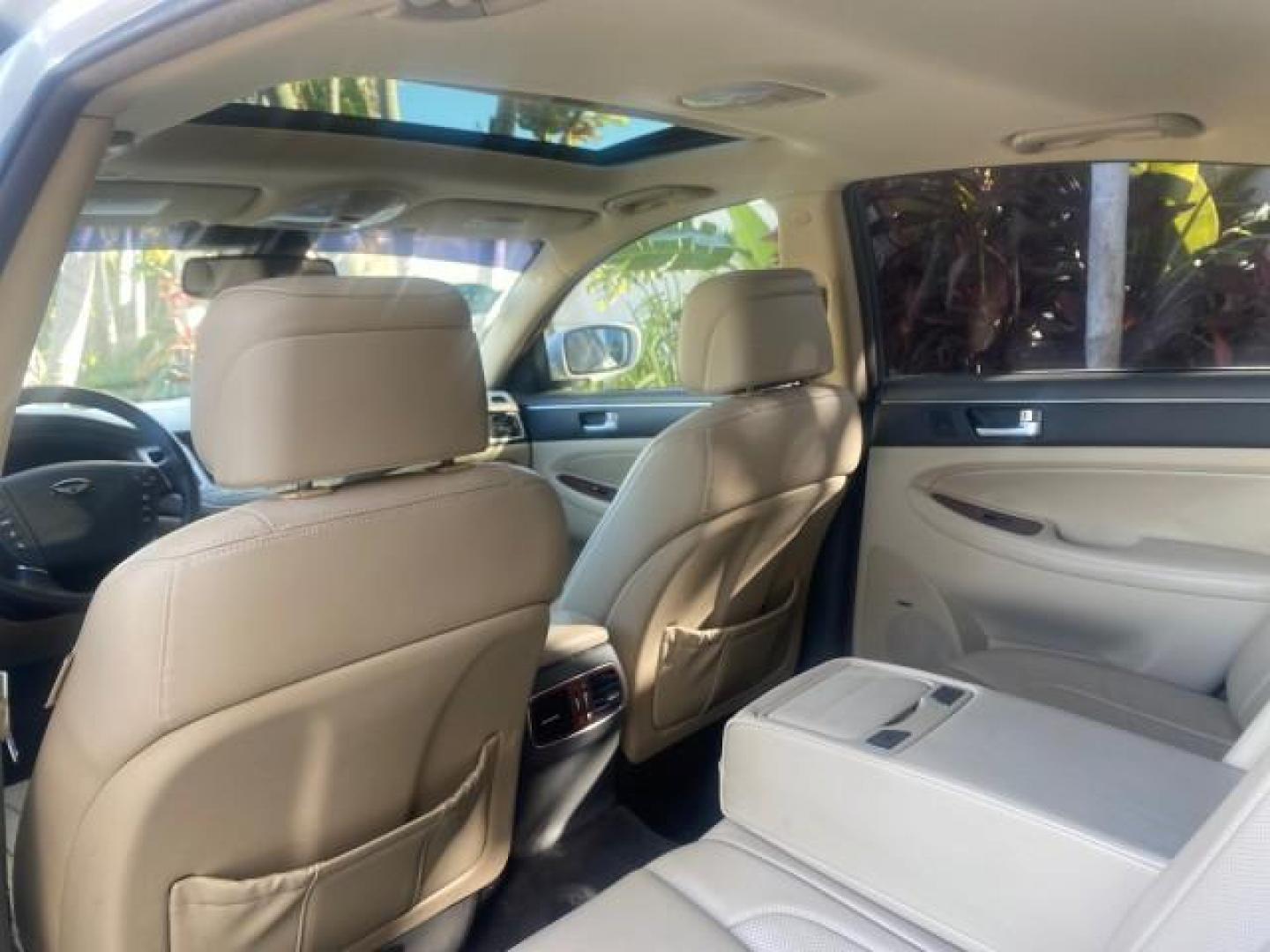 2012 White Satin Pearl /Saddle Hyundai Genesis 4.6L V8 LOW MILES PEARL WHITE (KMHGC4DF6CU) with an 4.6L DOHC MPI 32-Valve V8 Engine engine, Automatic transmission, located at 4701 North Dixie Hwy, Pompano Beach, FL, 33064, (954) 422-2889, 26.240938, -80.123474 - OUR WEBPAGE FLORIDACARS1.COM HAS OVER 100 PHOTOS AND FREE CARFAX LINK 2012 HYUNDAI GENESIS 4.6L V8 THIS CAR IS LOADED WITH EVERY OPTION POSSIBLE NEW $44,500 VIN: KMHGC4DF6CU166625 K M H G C 4 D F 6 C U 1 6 6 6 2 5 SEDAN 4 DR 4.6L V8 F DOHC 32V GASOLINE 25 MPG REAR WHEEL DRIVE Features A/C Seat(s) AB - Photo#82