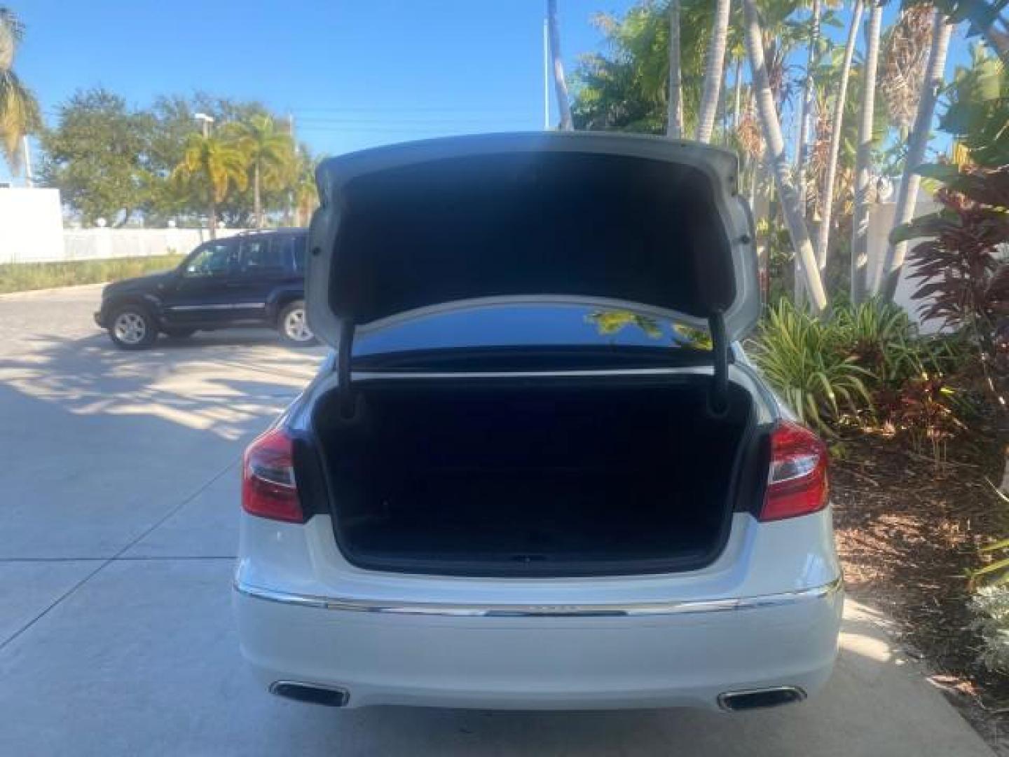 2012 White Satin Pearl /Saddle Hyundai Genesis 4.6L V8 LOW MILES PEARL WHITE (KMHGC4DF6CU) with an 4.6L DOHC MPI 32-Valve V8 Engine engine, Automatic transmission, located at 4701 North Dixie Hwy, Pompano Beach, FL, 33064, (954) 422-2889, 26.240938, -80.123474 - OUR WEBPAGE FLORIDACARS1.COM HAS OVER 100 PHOTOS AND FREE CARFAX LINK 2012 HYUNDAI GENESIS 4.6L V8 THIS CAR IS LOADED WITH EVERY OPTION POSSIBLE NEW $44,500 VIN: KMHGC4DF6CU166625 K M H G C 4 D F 6 C U 1 6 6 6 2 5 SEDAN 4 DR 4.6L V8 F DOHC 32V GASOLINE 25 MPG REAR WHEEL DRIVE Features A/C Seat(s) AB - Photo#94