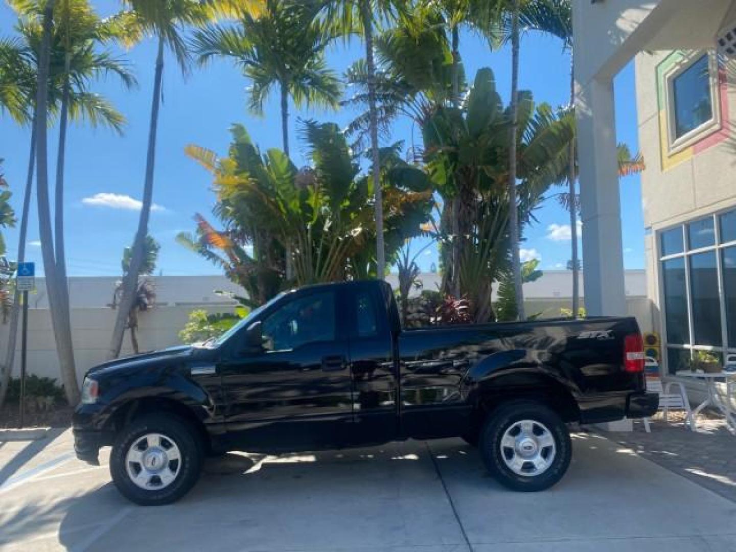 2004 Black /Flint Ford F-150 STX LOW MILES 46,755 4WD (1FTRF14W54N) with an 4.6L EFI V8 Engine engine, Automatic transmission, located at 4701 North Dixie Hwy, Pompano Beach, FL, 33064, (954) 422-2889, 26.240938, -80.123474 - OUR WEBPAGE FLORIDACARS1.COM HAS OVER 100 PHOTOS AND FREE CARFAX LINK 2004 FORD F-150 STX 4WD WE HAVE THE LOWEST MILEAGE ONE FOR SALE IN THE COUNTRY 46,755 VIN: 1FTRF14W54NB29502 1 F T R F 1 4 W 5 4 N B 2 9 5 0 2 PICKUP 4.6L V8 F SOHC 16V GASOLINE 18 MPG REAR WHEEL DRIVE W/ 4X4 Features 4WD/AWD ABS - Photo#4