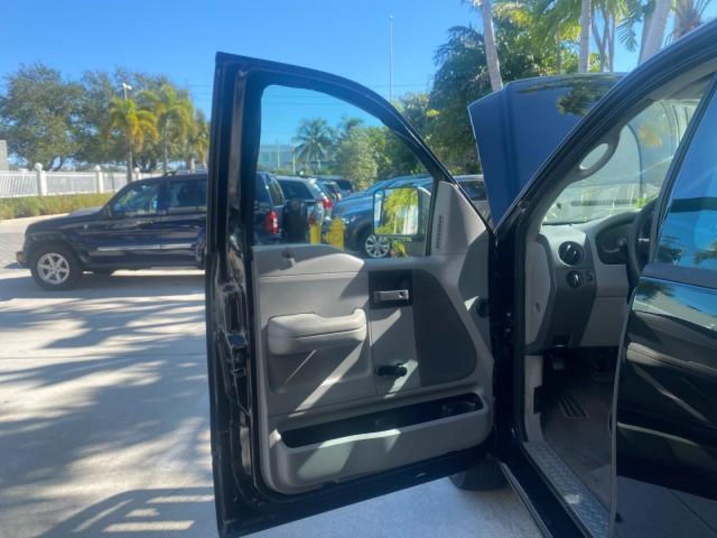 2004 Black /Flint Ford F-150 STX LOW MILES 46,755 4WD (1FTRF14W54N) with an 4.6L EFI V8 Engine engine, Automatic transmission, located at 4701 North Dixie Hwy, Pompano Beach, FL, 33064, (954) 422-2889, 26.240938, -80.123474 - OUR WEBPAGE FLORIDACARS1.COM HAS OVER 100 PHOTOS AND FREE CARFAX LINK 2004 FORD F-150 STX 4WD WE HAVE THE LOWEST MILEAGE ONE FOR SALE IN THE COUNTRY 46,755 VIN: 1FTRF14W54NB29502 1 F T R F 1 4 W 5 4 N B 2 9 5 0 2 PICKUP 4.6L V8 F SOHC 16V GASOLINE 18 MPG REAR WHEEL DRIVE W/ 4X4 Features 4WD/AWD ABS - Photo#9