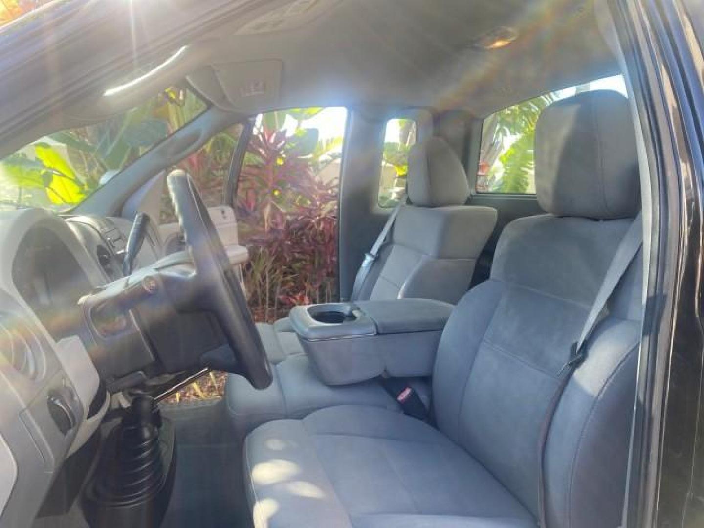2004 Black /Flint Ford F-150 STX LOW MILES 46,755 4WD (1FTRF14W54N) with an 4.6L EFI V8 Engine engine, Automatic transmission, located at 4701 North Dixie Hwy, Pompano Beach, FL, 33064, (954) 422-2889, 26.240938, -80.123474 - OUR WEBPAGE FLORIDACARS1.COM HAS OVER 100 PHOTOS AND FREE CARFAX LINK 2004 FORD F-150 STX 4WD WE HAVE THE LOWEST MILEAGE ONE FOR SALE IN THE COUNTRY 46,755 VIN: 1FTRF14W54NB29502 1 F T R F 1 4 W 5 4 N B 2 9 5 0 2 PICKUP 4.6L V8 F SOHC 16V GASOLINE 18 MPG REAR WHEEL DRIVE W/ 4X4 Features 4WD/AWD ABS - Photo#10