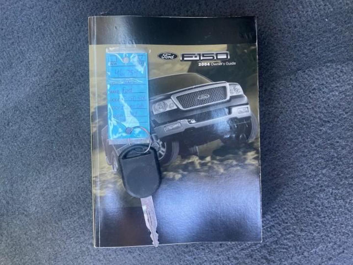 2004 Black /Flint Ford F-150 STX LOW MILES 46,755 4WD (1FTRF14W54N) with an 4.6L EFI V8 Engine engine, Automatic transmission, located at 4701 North Dixie Hwy, Pompano Beach, FL, 33064, (954) 422-2889, 26.240938, -80.123474 - OUR WEBPAGE FLORIDACARS1.COM HAS OVER 100 PHOTOS AND FREE CARFAX LINK 2004 FORD F-150 STX 4WD WE HAVE THE LOWEST MILEAGE ONE FOR SALE IN THE COUNTRY 46,755 VIN: 1FTRF14W54NB29502 1 F T R F 1 4 W 5 4 N B 2 9 5 0 2 PICKUP 4.6L V8 F SOHC 16V GASOLINE 18 MPG REAR WHEEL DRIVE W/ 4X4 Features 4WD/AWD ABS - Photo#23