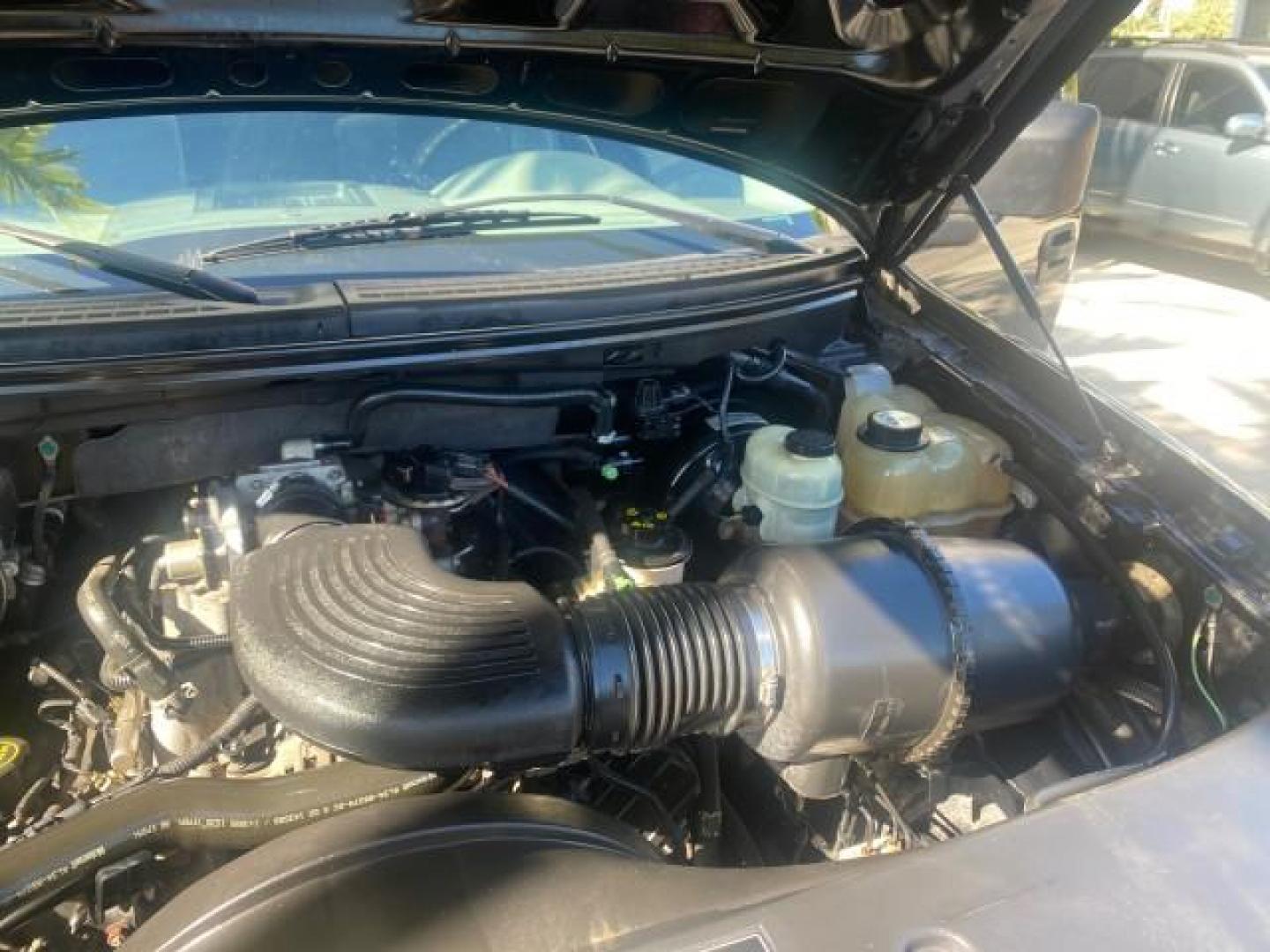 2004 Black /Flint Ford F-150 STX LOW MILES 46,755 4WD (1FTRF14W54N) with an 4.6L EFI V8 Engine engine, Automatic transmission, located at 4701 North Dixie Hwy, Pompano Beach, FL, 33064, (954) 422-2889, 26.240938, -80.123474 - OUR WEBPAGE FLORIDACARS1.COM HAS OVER 100 PHOTOS AND FREE CARFAX LINK 2004 FORD F-150 STX 4WD WE HAVE THE LOWEST MILEAGE ONE FOR SALE IN THE COUNTRY 46,755 VIN: 1FTRF14W54NB29502 1 F T R F 1 4 W 5 4 N B 2 9 5 0 2 PICKUP 4.6L V8 F SOHC 16V GASOLINE 18 MPG REAR WHEEL DRIVE W/ 4X4 Features 4WD/AWD ABS - Photo#25