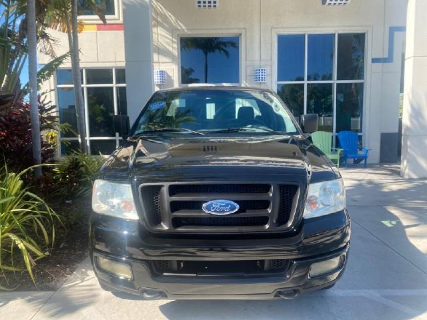 2004 Black /Flint Ford F-150 STX LOW MILES 46,755 4WD (1FTRF14W54N) with an 4.6L EFI V8 Engine engine, Automatic transmission, located at 4701 North Dixie Hwy, Pompano Beach, FL, 33064, (954) 422-2889, 26.240938, -80.123474 - OUR WEBPAGE FLORIDACARS1.COM HAS OVER 100 PHOTOS AND FREE CARFAX LINK 2004 FORD F-150 STX 4WD WE HAVE THE LOWEST MILEAGE ONE FOR SALE IN THE COUNTRY 46,755 VIN: 1FTRF14W54NB29502 1 F T R F 1 4 W 5 4 N B 2 9 5 0 2 PICKUP 4.6L V8 F SOHC 16V GASOLINE 18 MPG REAR WHEEL DRIVE W/ 4X4 Features 4WD/AWD ABS - Photo#27