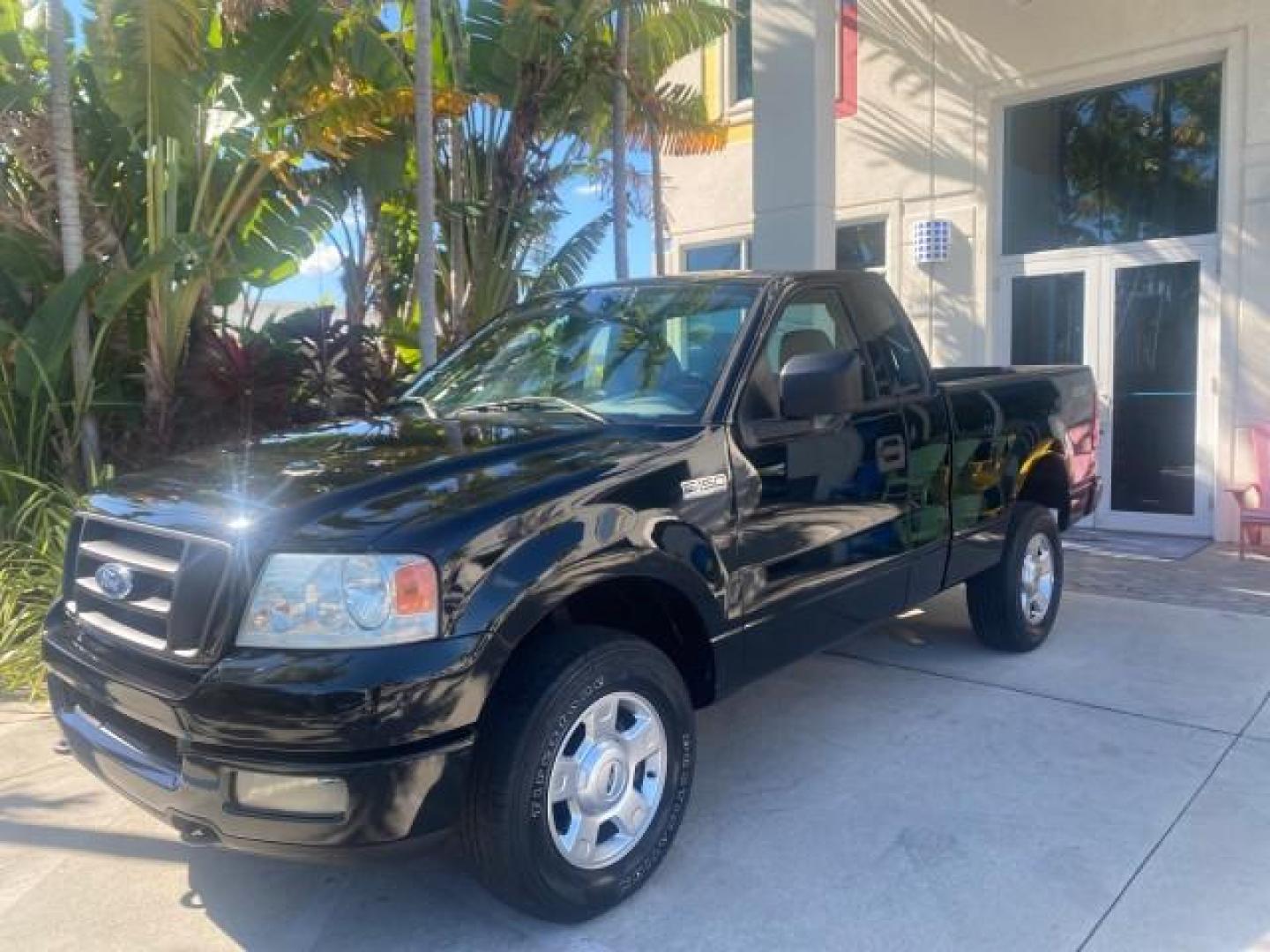 2004 Black /Flint Ford F-150 STX LOW MILES 46,755 4WD (1FTRF14W54N) with an 4.6L EFI V8 Engine engine, Automatic transmission, located at 4701 North Dixie Hwy, Pompano Beach, FL, 33064, (954) 422-2889, 26.240938, -80.123474 - OUR WEBPAGE FLORIDACARS1.COM HAS OVER 100 PHOTOS AND FREE CARFAX LINK 2004 FORD F-150 STX 4WD WE HAVE THE LOWEST MILEAGE ONE FOR SALE IN THE COUNTRY 46,755 VIN: 1FTRF14W54NB29502 1 F T R F 1 4 W 5 4 N B 2 9 5 0 2 PICKUP 4.6L V8 F SOHC 16V GASOLINE 18 MPG REAR WHEEL DRIVE W/ 4X4 Features 4WD/AWD ABS - Photo#29