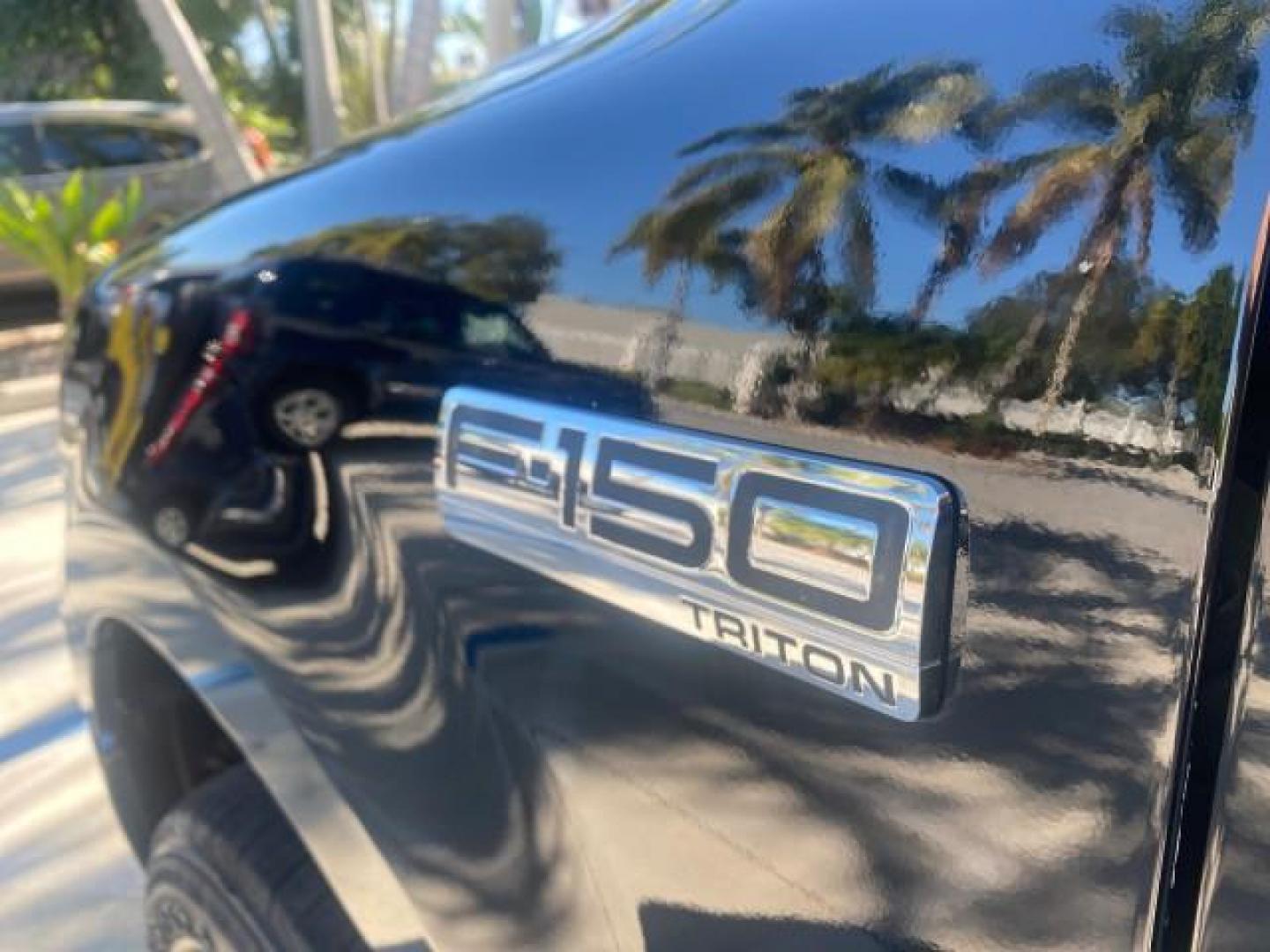 2004 Black /Flint Ford F-150 STX LOW MILES 46,755 4WD (1FTRF14W54N) with an 4.6L EFI V8 Engine engine, Automatic transmission, located at 4701 North Dixie Hwy, Pompano Beach, FL, 33064, (954) 422-2889, 26.240938, -80.123474 - OUR WEBPAGE FLORIDACARS1.COM HAS OVER 100 PHOTOS AND FREE CARFAX LINK 2004 FORD F-150 STX 4WD WE HAVE THE LOWEST MILEAGE ONE FOR SALE IN THE COUNTRY 46,755 VIN: 1FTRF14W54NB29502 1 F T R F 1 4 W 5 4 N B 2 9 5 0 2 PICKUP 4.6L V8 F SOHC 16V GASOLINE 18 MPG REAR WHEEL DRIVE W/ 4X4 Features 4WD/AWD ABS - Photo#40