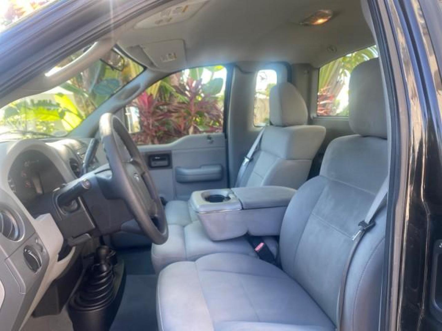 2004 Black /Flint Ford F-150 STX LOW MILES 46,755 4WD (1FTRF14W54N) with an 4.6L EFI V8 Engine engine, Automatic transmission, located at 4701 North Dixie Hwy, Pompano Beach, FL, 33064, (954) 422-2889, 26.240938, -80.123474 - OUR WEBPAGE FLORIDACARS1.COM HAS OVER 100 PHOTOS AND FREE CARFAX LINK 2004 FORD F-150 STX 4WD WE HAVE THE LOWEST MILEAGE ONE FOR SALE IN THE COUNTRY 46,755 VIN: 1FTRF14W54NB29502 1 F T R F 1 4 W 5 4 N B 2 9 5 0 2 PICKUP 4.6L V8 F SOHC 16V GASOLINE 18 MPG REAR WHEEL DRIVE W/ 4X4 Features 4WD/AWD ABS - Photo#44