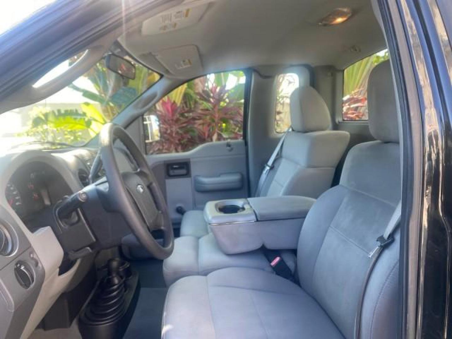 2004 Black /Flint Ford F-150 STX LOW MILES 46,755 4WD (1FTRF14W54N) with an 4.6L EFI V8 Engine engine, Automatic transmission, located at 4701 North Dixie Hwy, Pompano Beach, FL, 33064, (954) 422-2889, 26.240938, -80.123474 - OUR WEBPAGE FLORIDACARS1.COM HAS OVER 100 PHOTOS AND FREE CARFAX LINK 2004 FORD F-150 STX 4WD WE HAVE THE LOWEST MILEAGE ONE FOR SALE IN THE COUNTRY 46,755 VIN: 1FTRF14W54NB29502 1 F T R F 1 4 W 5 4 N B 2 9 5 0 2 PICKUP 4.6L V8 F SOHC 16V GASOLINE 18 MPG REAR WHEEL DRIVE W/ 4X4 Features 4WD/AWD ABS - Photo#45